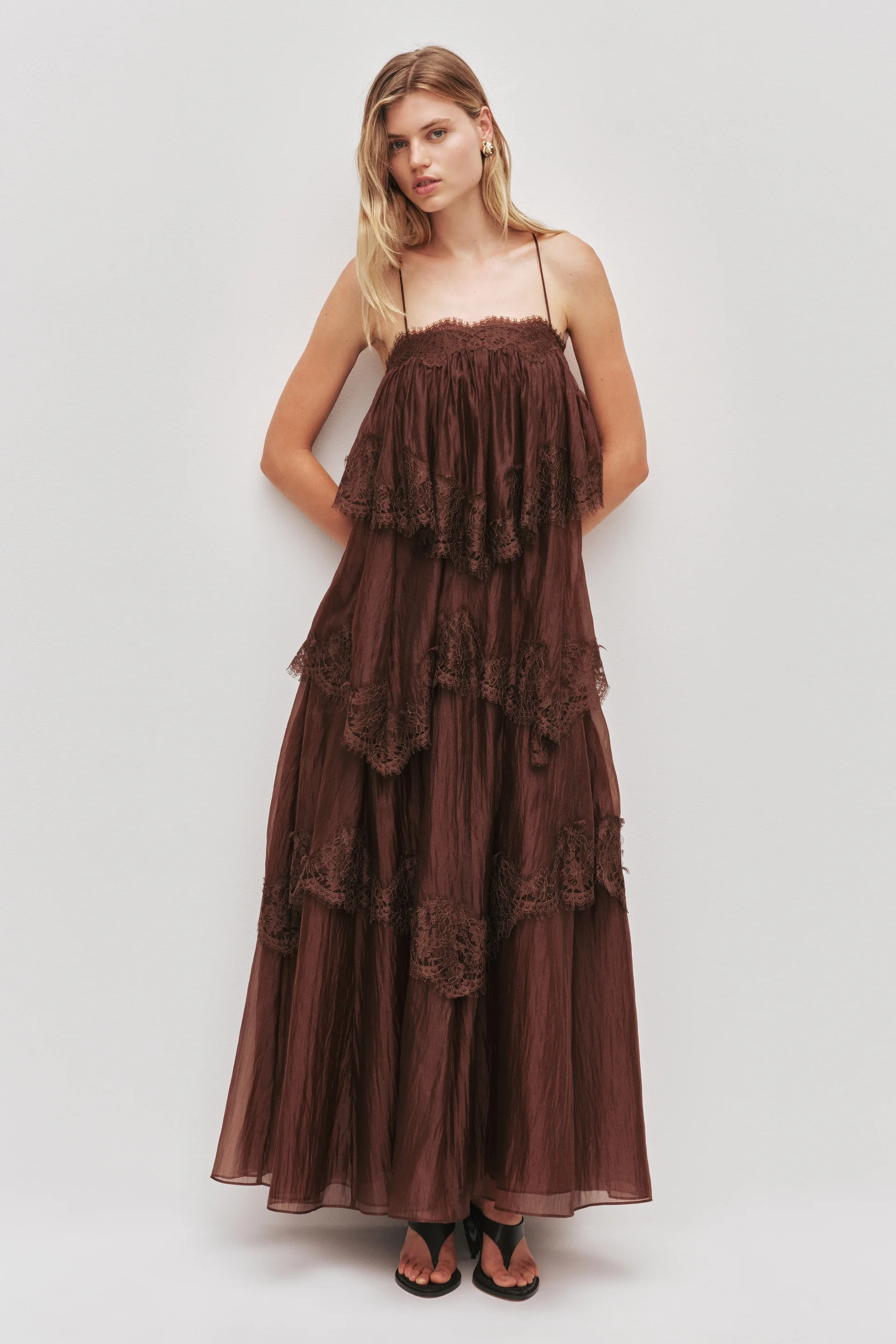 This maxi dress, adorned with cascading lace ruffles, is perfect for weddings, parties, vacations, beach trips, or even everyday casual wear.