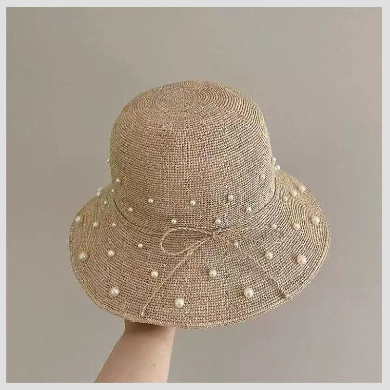 The wide-brim design effectively blocks UV rays, making it the perfect choice for beach vacations, summer outfits, and casual resort wear.