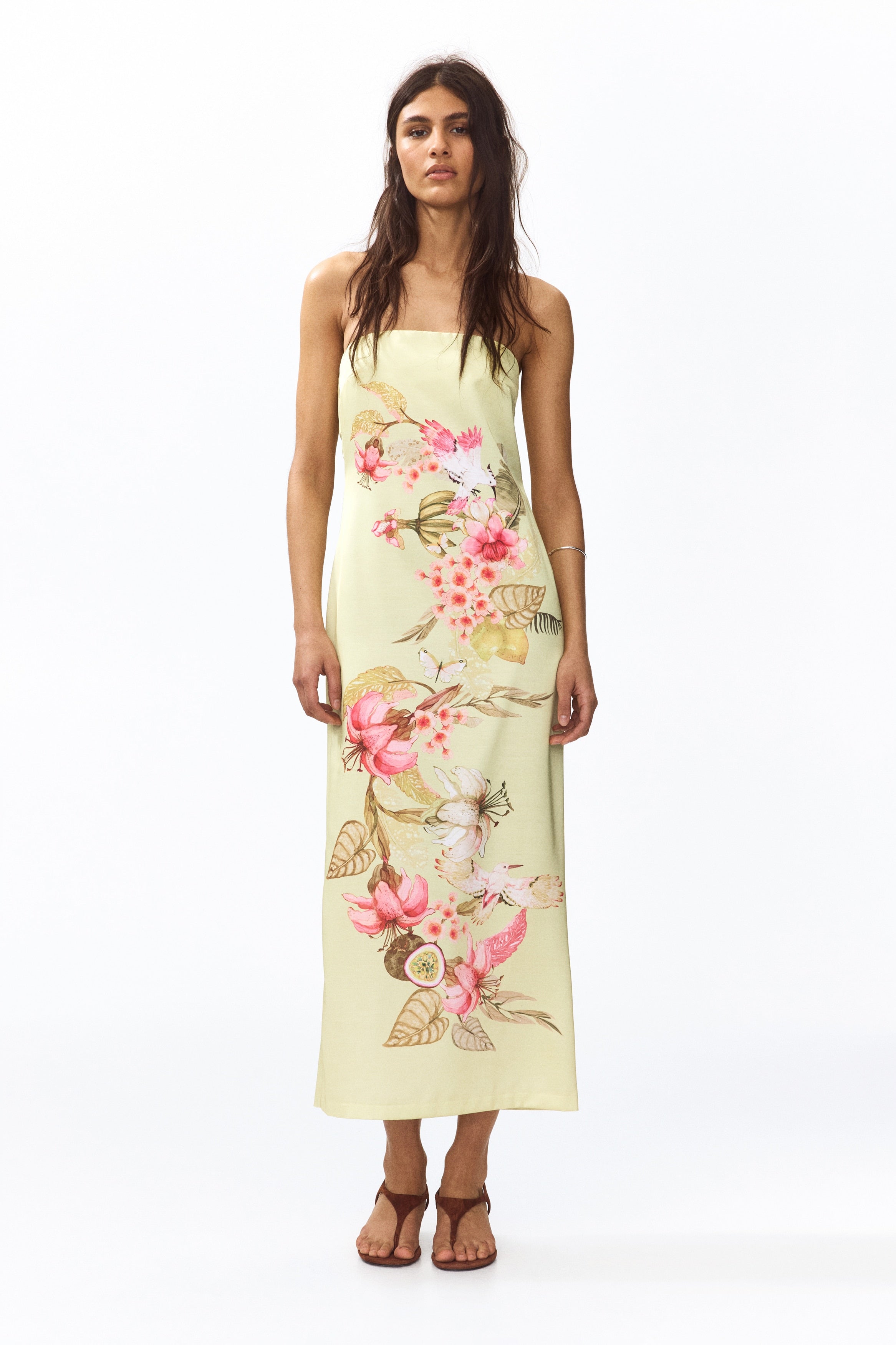 Floral Strapless Maxi Dress. Strapless neckline, and elegant lemon-yellow silhouette—perfect for vacations, beach holidays, and summer events.