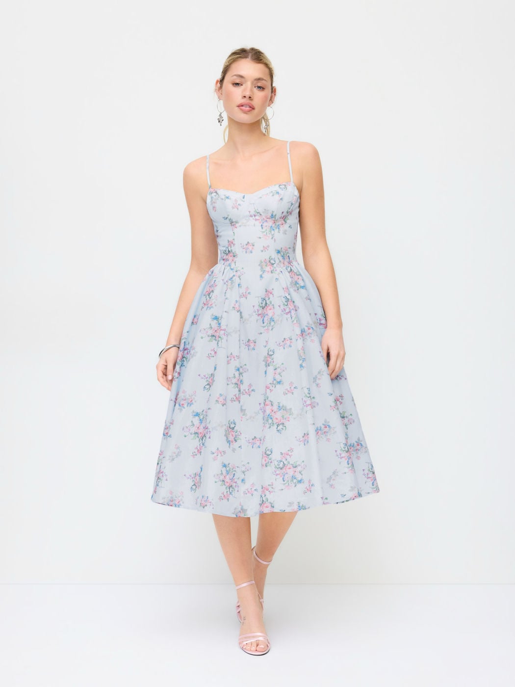 Blue Floral Midi Dress. Featuring a delicate floral print  And elegant midi silhouette—perfect for vacations, weddings, brunch dates, and summer events.