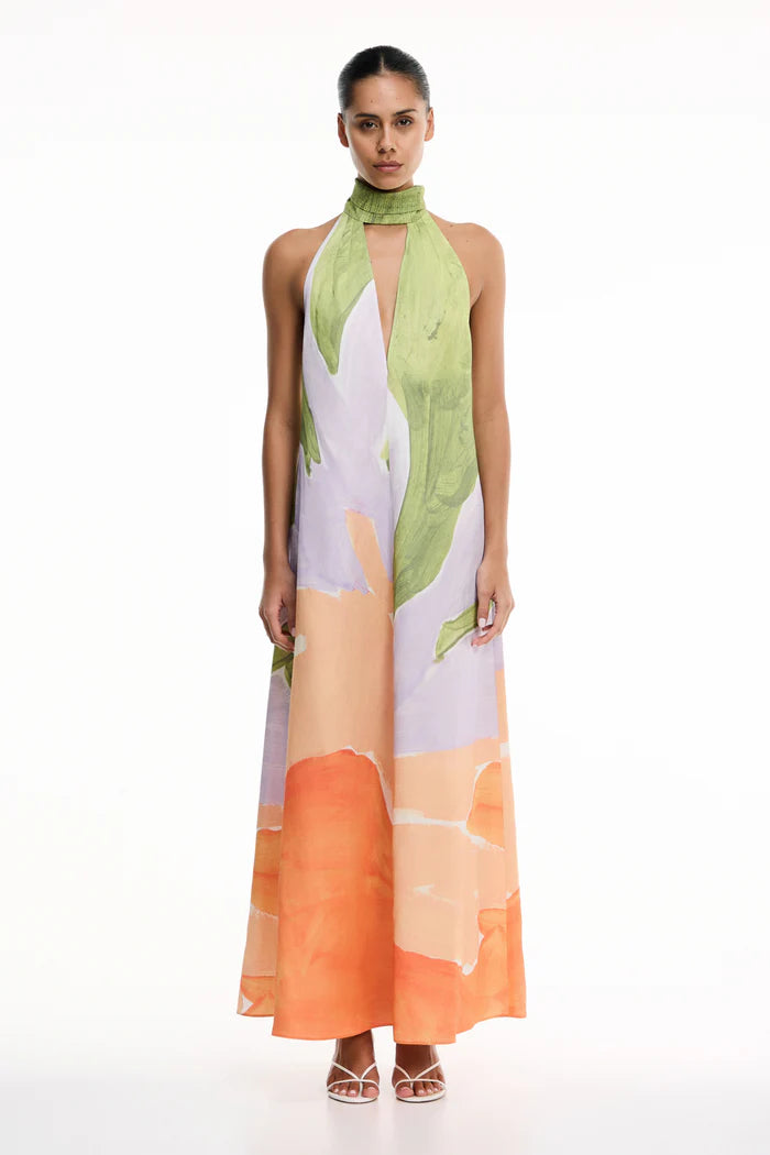 Watercolor Halter Maxi Dress. Featuring a high-neck halter design, and flowy floor-length silhouette—perfect for vacations, weddings, and summer events.