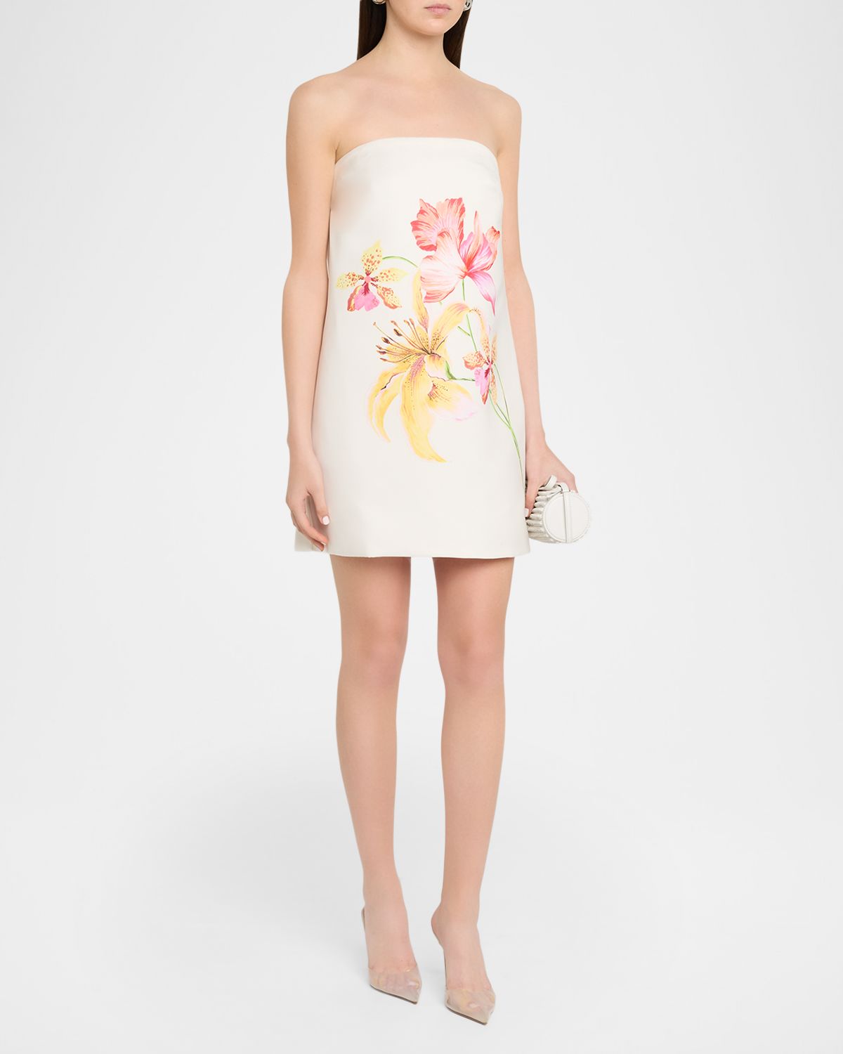 White Strapless Floral Mini Dress. Featuring soft floral print, strapless design, and mini length—perfect for summer outings and brunches.