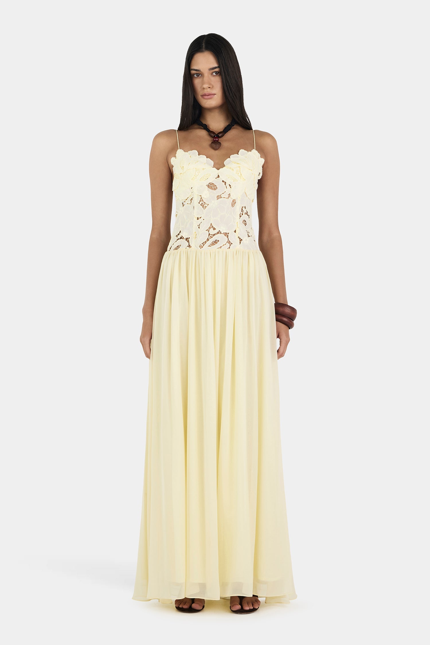 Yellow Sheer Lace Bodice Maxi Dress. Featuring a floral lace bodice—perfect for beach weddings, romantic resort nights, and summer evening events.