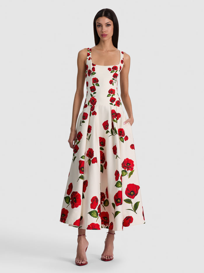 Floral Pleated Midi Dress. Sweeping A-line skirt with hidden pockets—perfect for summer weddings and elegant resort evenings.