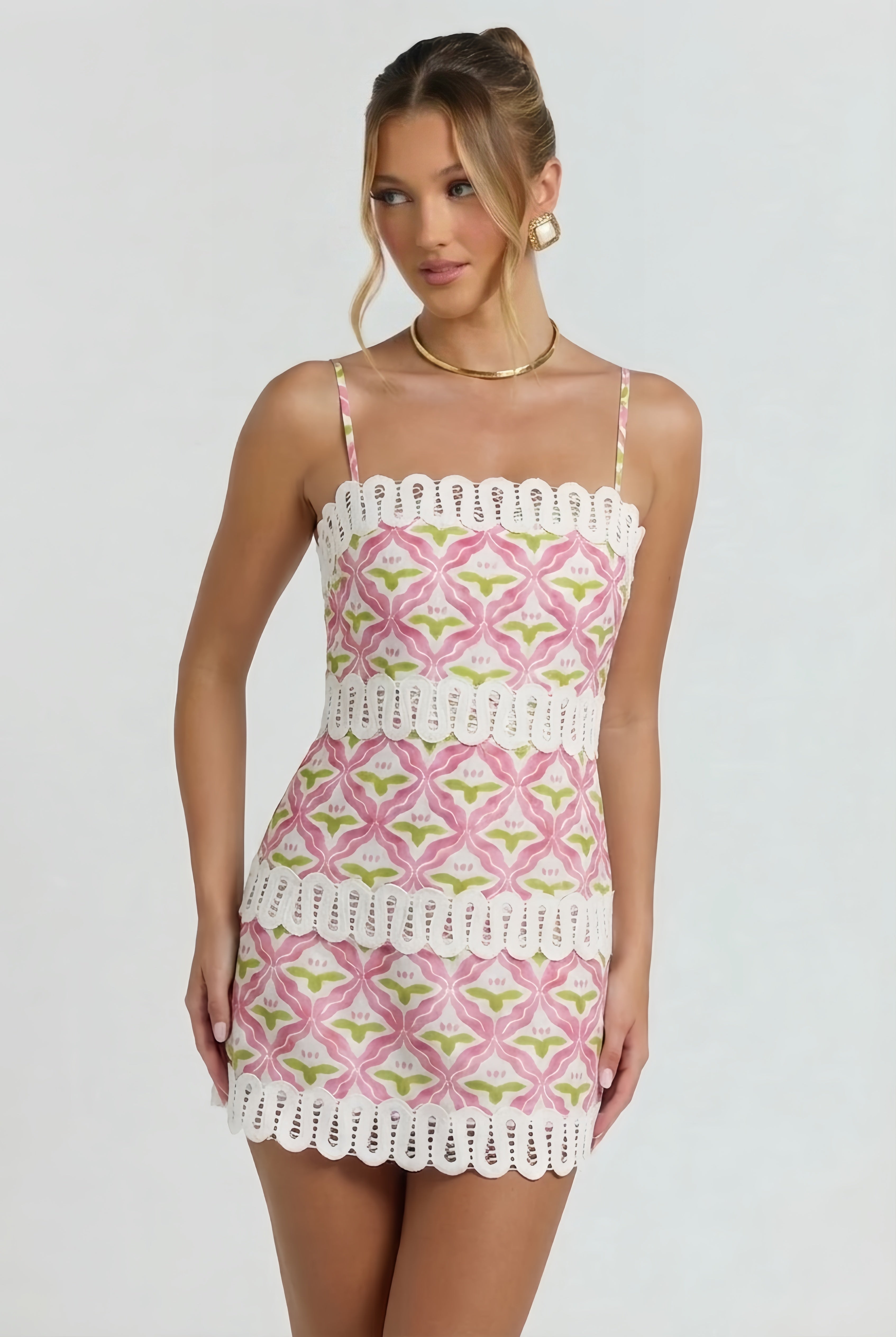 Geometric Scallop Trim Mini Dress.Delicate spaghetti straps, and tiered white eyelet scallop trims—perfect for summer brunches and seaside vacations.