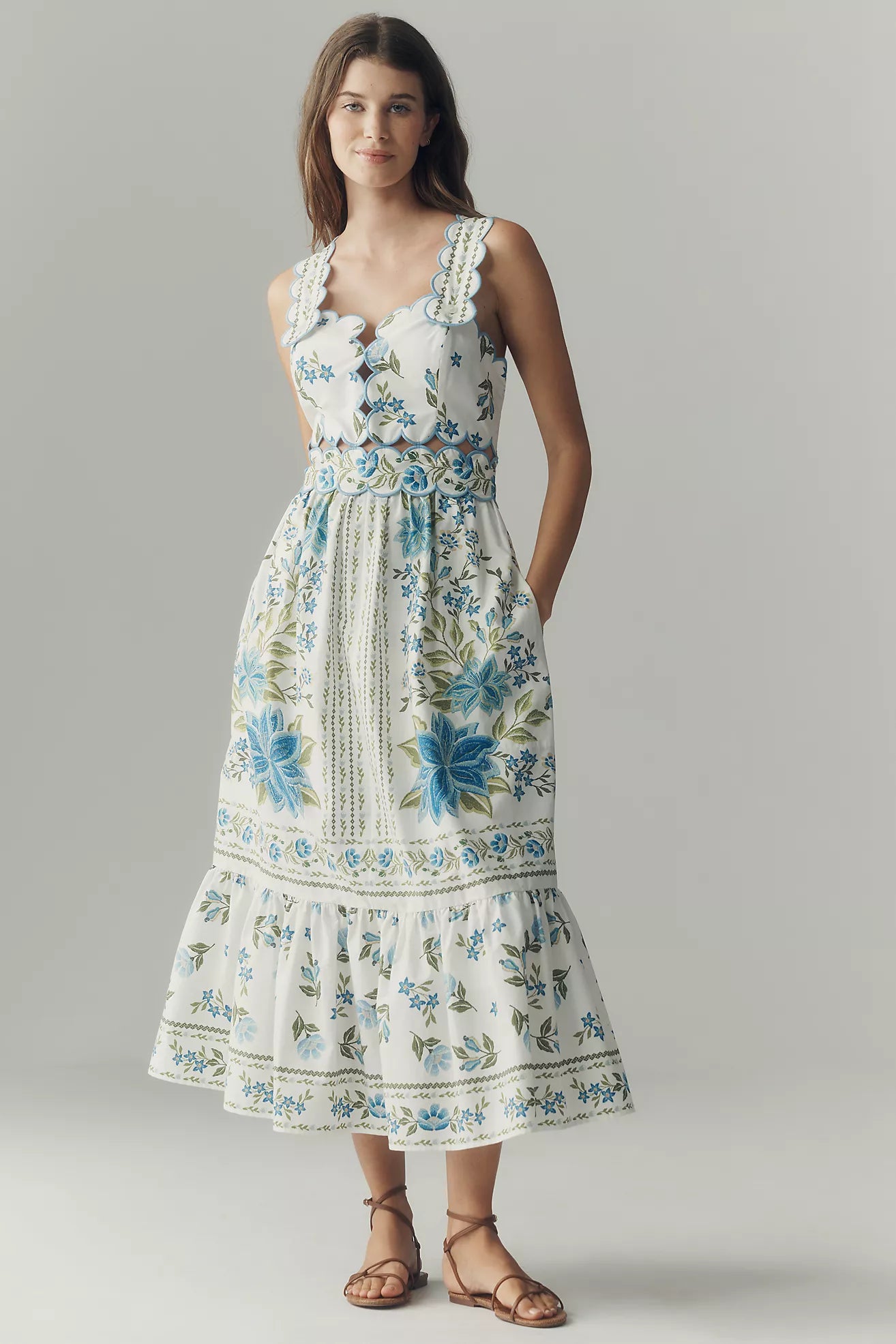 Floral Scallop Cutout Midi Dress. Featuring a Mediterranean-inspired botanical print, delicate scalloped cutouts—perfect for getaways and summer garden parties.