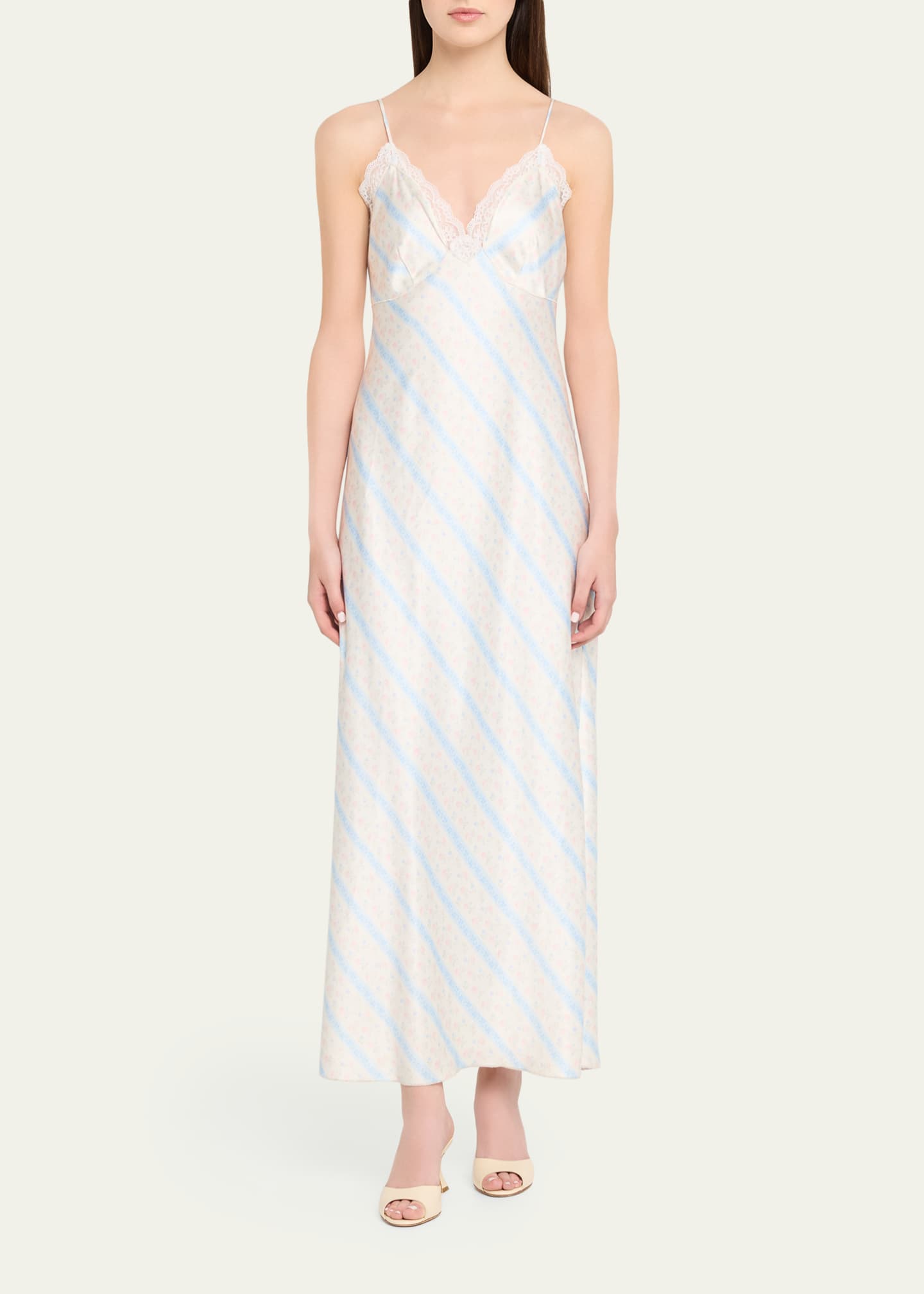 Lace-Trim Slip Dress. Delicate V-neck lace detailing, and a soft diagonal stripe pattern—perfect for elegant resort evenings and refined summer occasions.