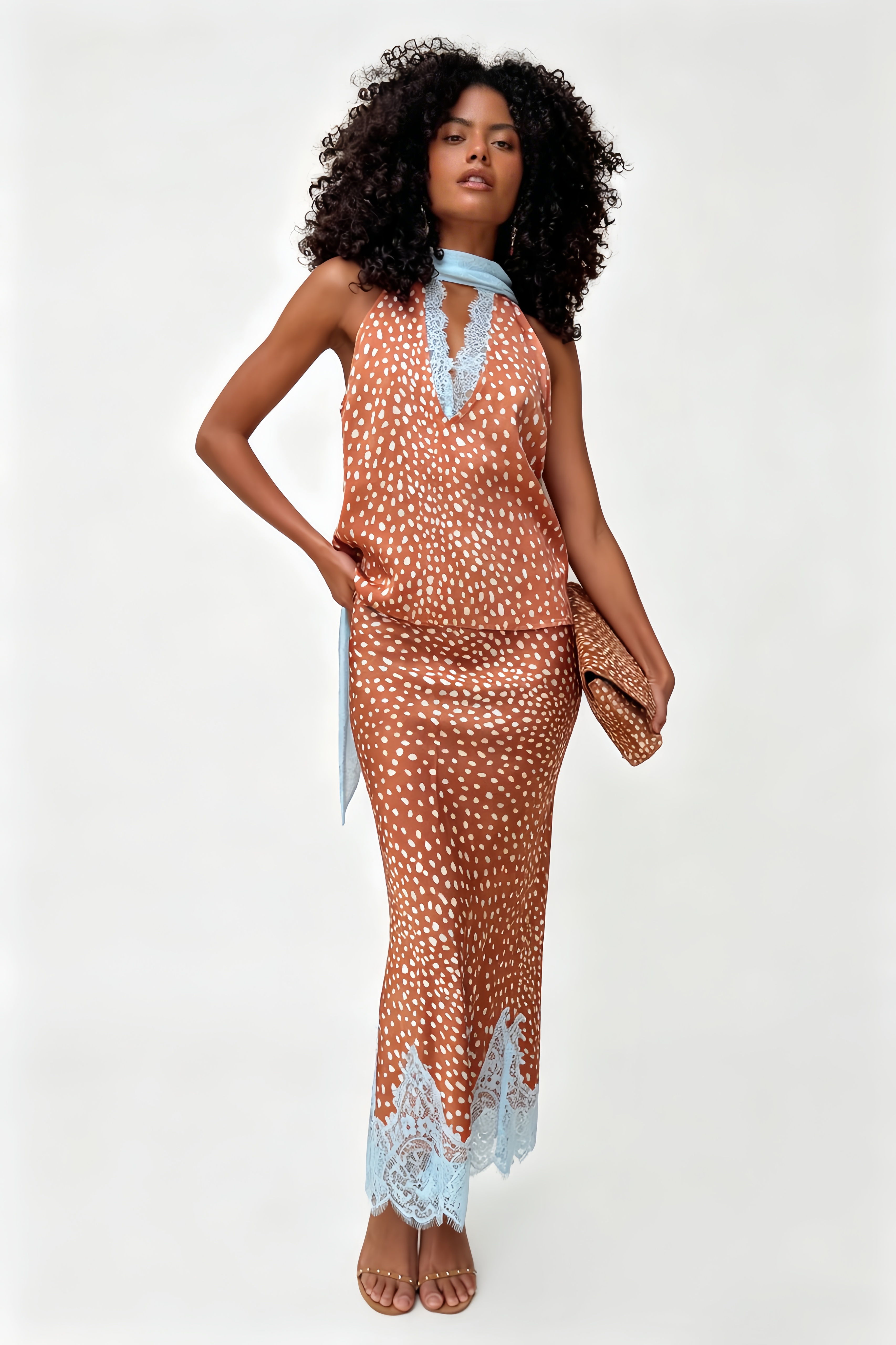 Print Lace-Trim Two-Piece Set. Plunging halter neckline, and contrasting light blue lace trim—perfect for sunset dinners and tropical getaways.