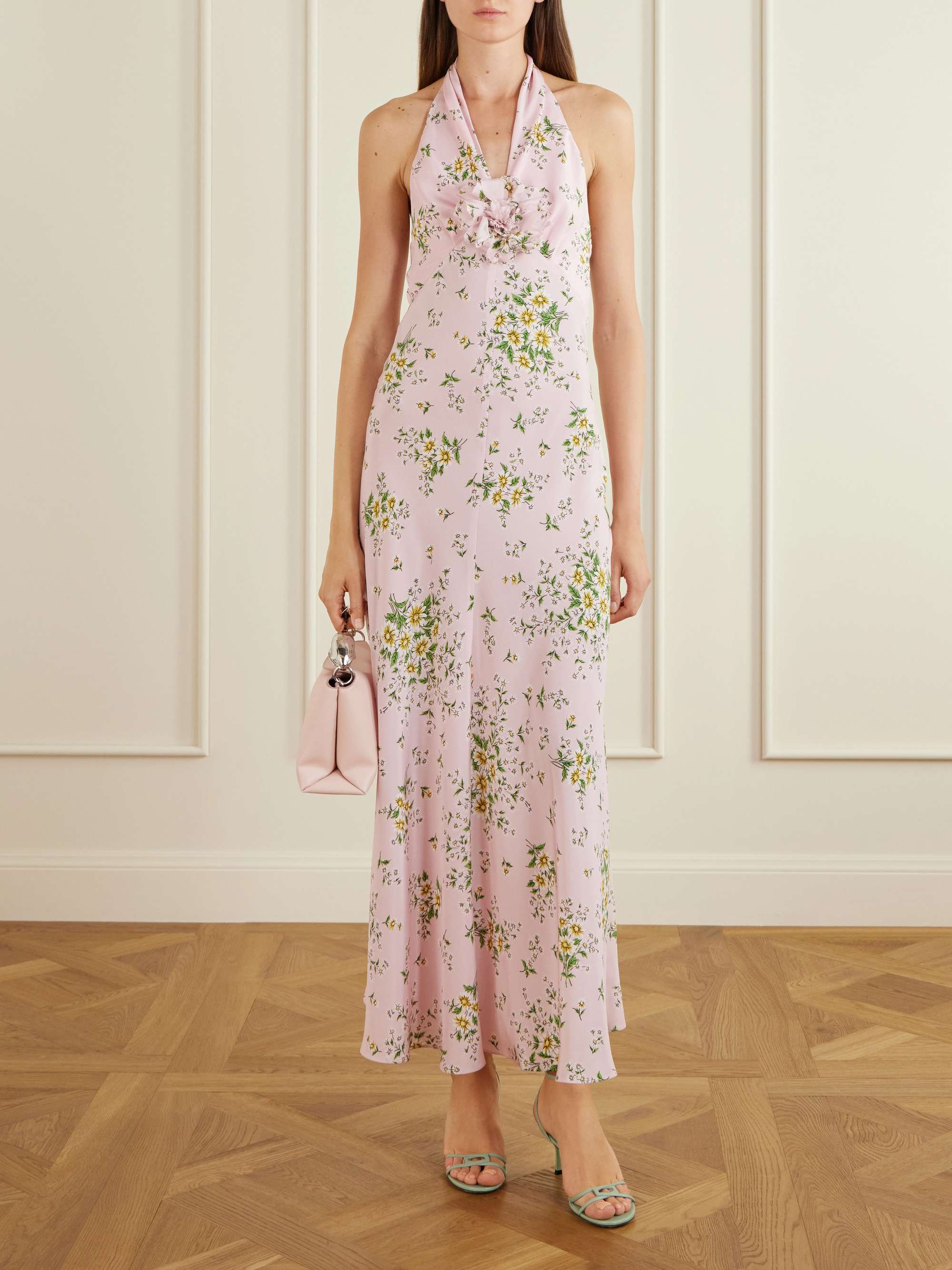 Floral Print Halter Maxi Dress. Elegant halter neckline with rosette embellishment—the perfect choice for your next summer garden party or luxury getaway.