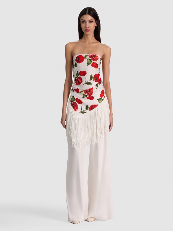 Print Fringe Bandeau Top. Elegant strapless bandeau silhouette, and white fringe detailing—the perfect bold statement piece for your next luxury resort getaway.