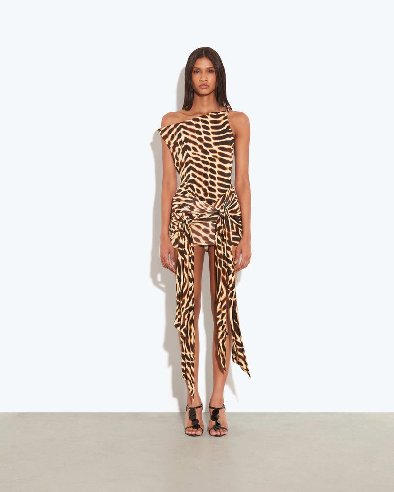 Make a statement in this adventurous Animal-print mini dress. Featuring a chic one-shoulder design and dramatic wrap-tie detailing for your next luxury getaway.