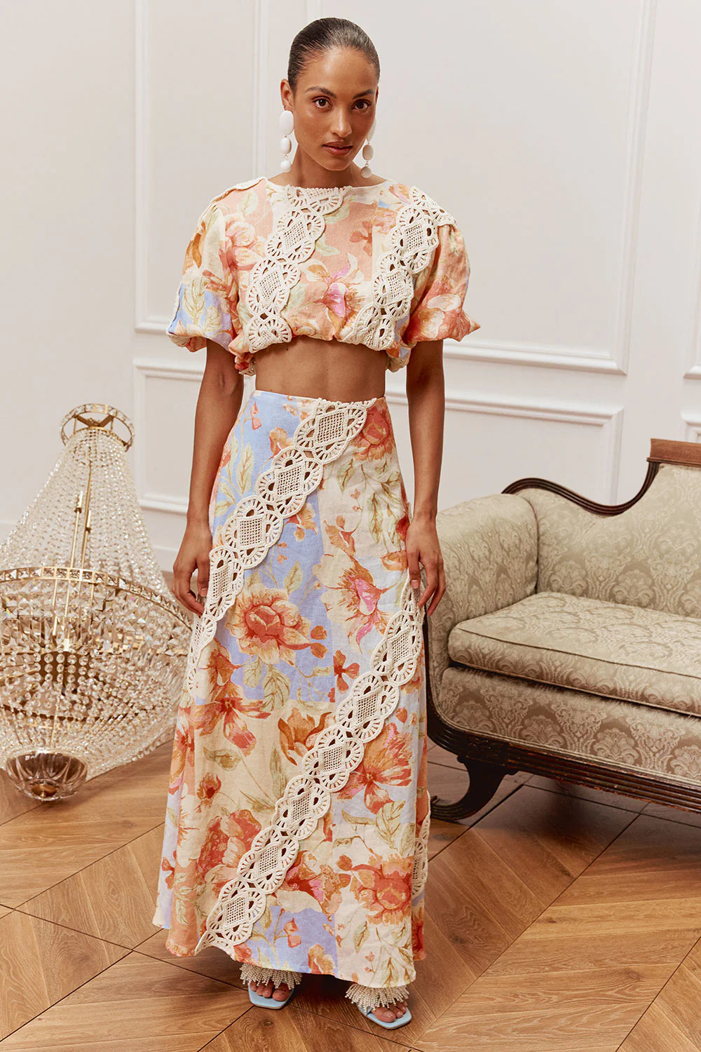 Floral Crochet Trim Set. Featuring a vibrant vintage floral print, intricate lace trim details, and a breezy silhouette perfect for elevated summer getaways.