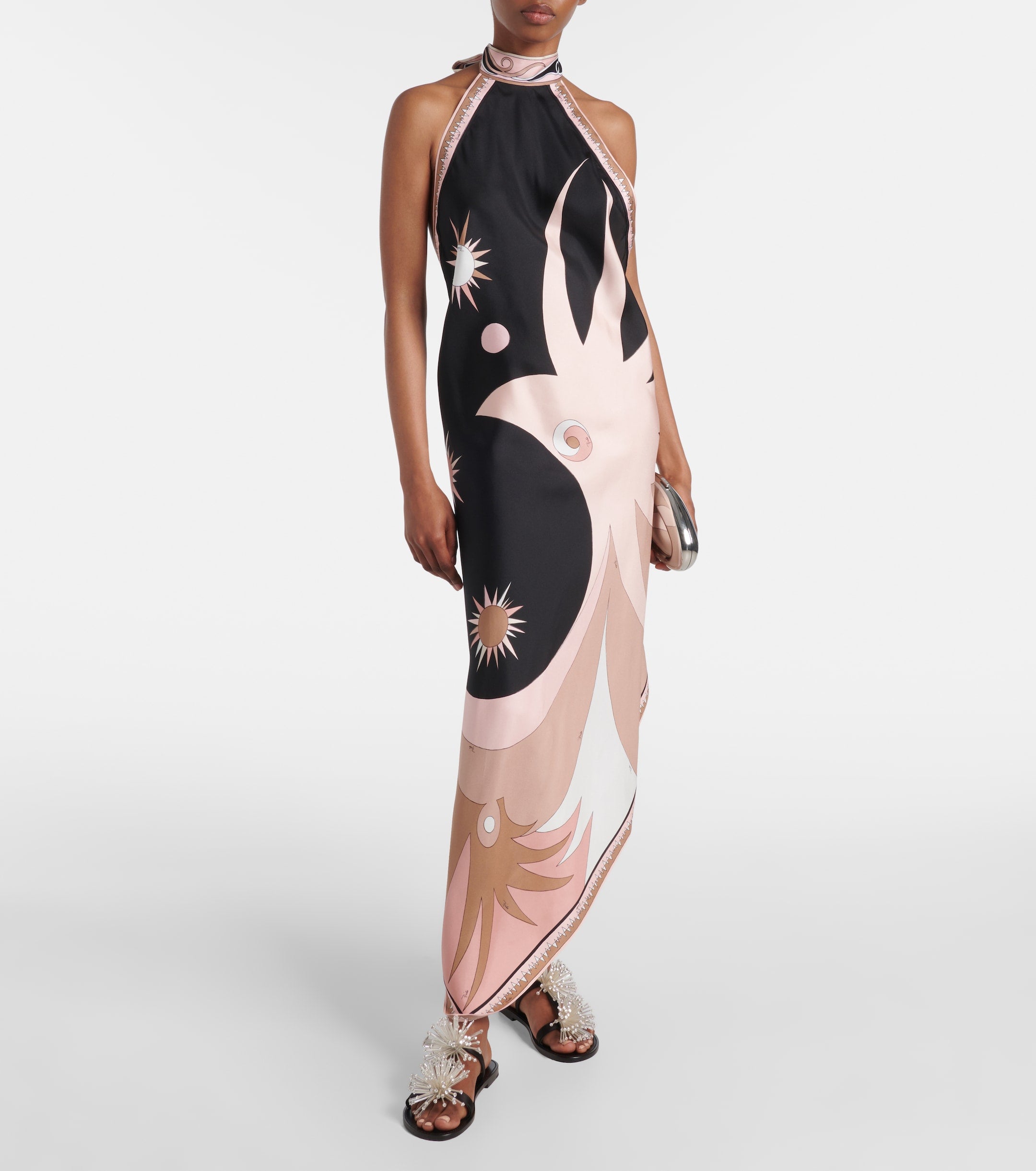 Celestial Motif Halter Maxi Dress. Modern halter neckline, and a fluid silhouette, this dress is the ultimate statement piece for refined summer soirées.