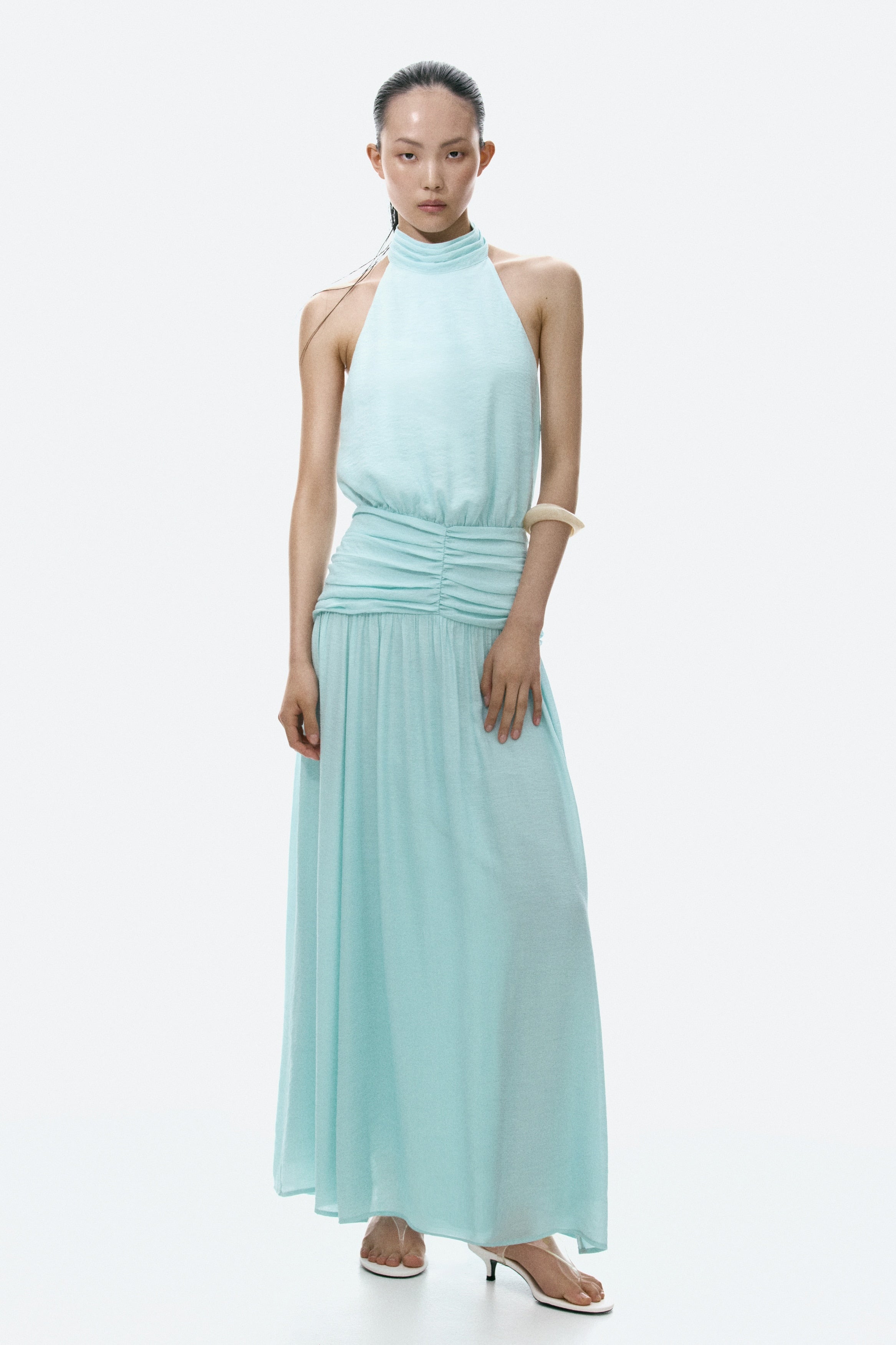 Mint Drape Halter Maxi Dress. With its clean lines, sophisticated ruched-waist detail, this maxi is the definition of refined, resort-chic style.