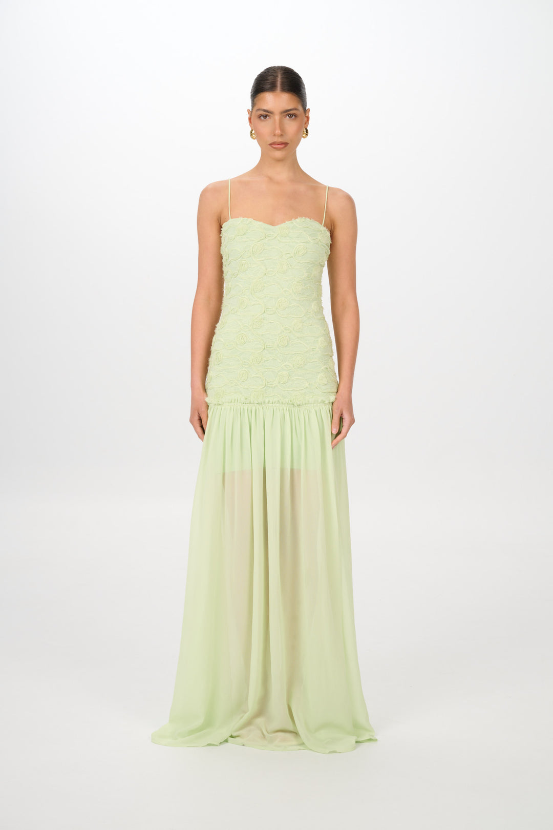 Textured Bodice Maxi Dress. Featuring a sophisticated textured bodice, voluminous skirt, this piece is the ultimate choice for elevated summer evenings.