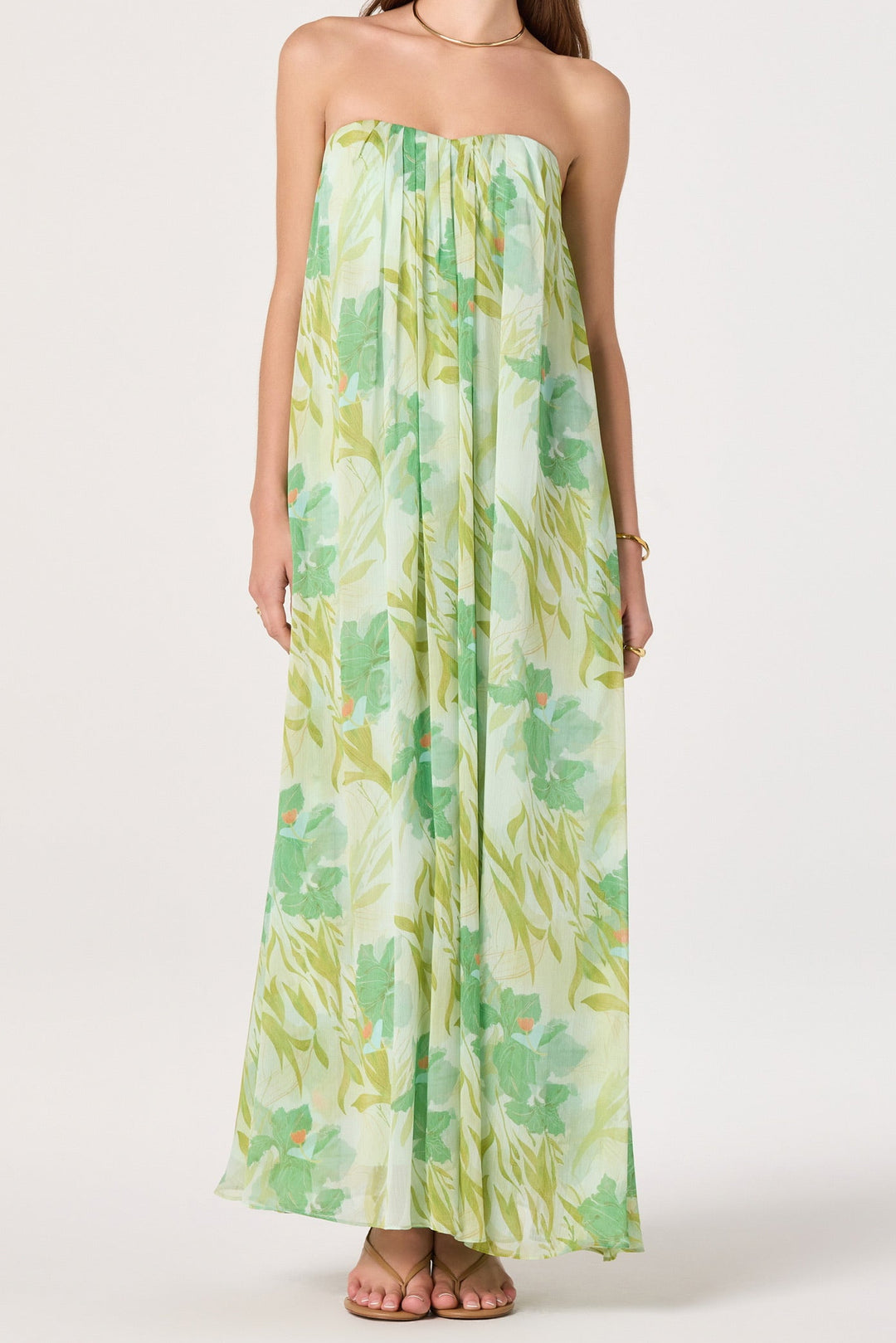 Green Floral Strapless Maxi Dress. Featuring a delicate floral print, this maxi is the ultimate choice for effortless, refined summer style.