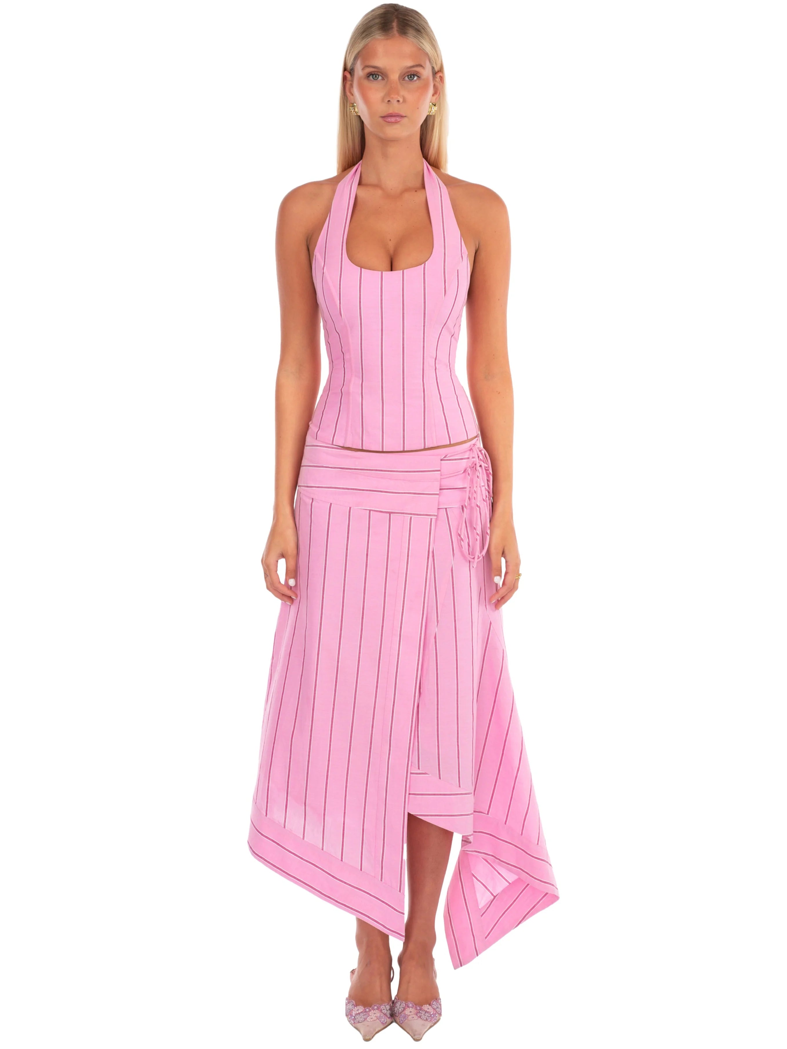 Stripe Halter Co-ord Set. Featuring a structured halter top and a chic asymmetric wrap skirt, this matching set is the ultimate choice for sophisticated resort wear.