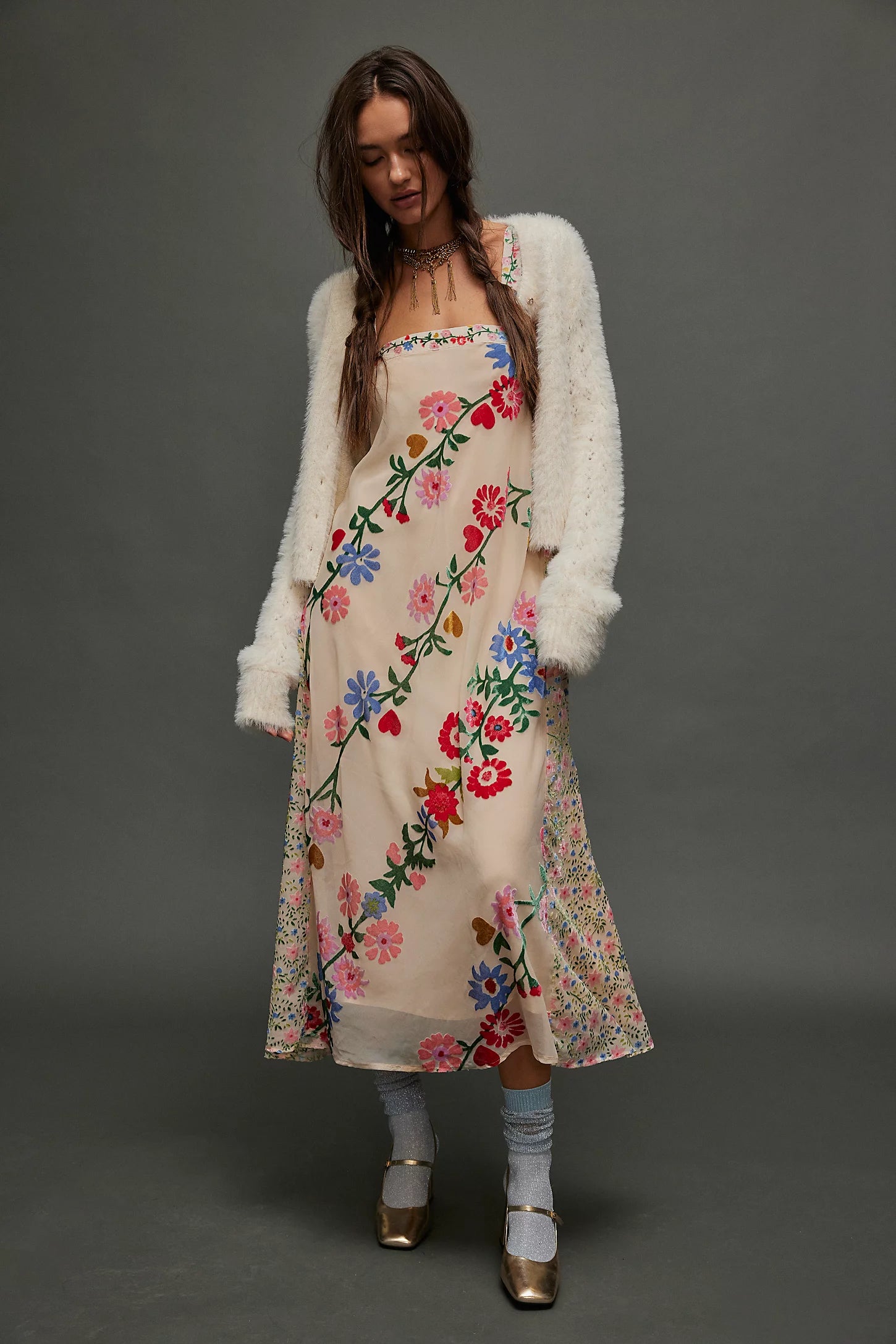 Floral Dress. With its intricate hand-touched floral, contrasting side panels,this piece is the ultimate choice for effortless, free-spirited summer elegance.