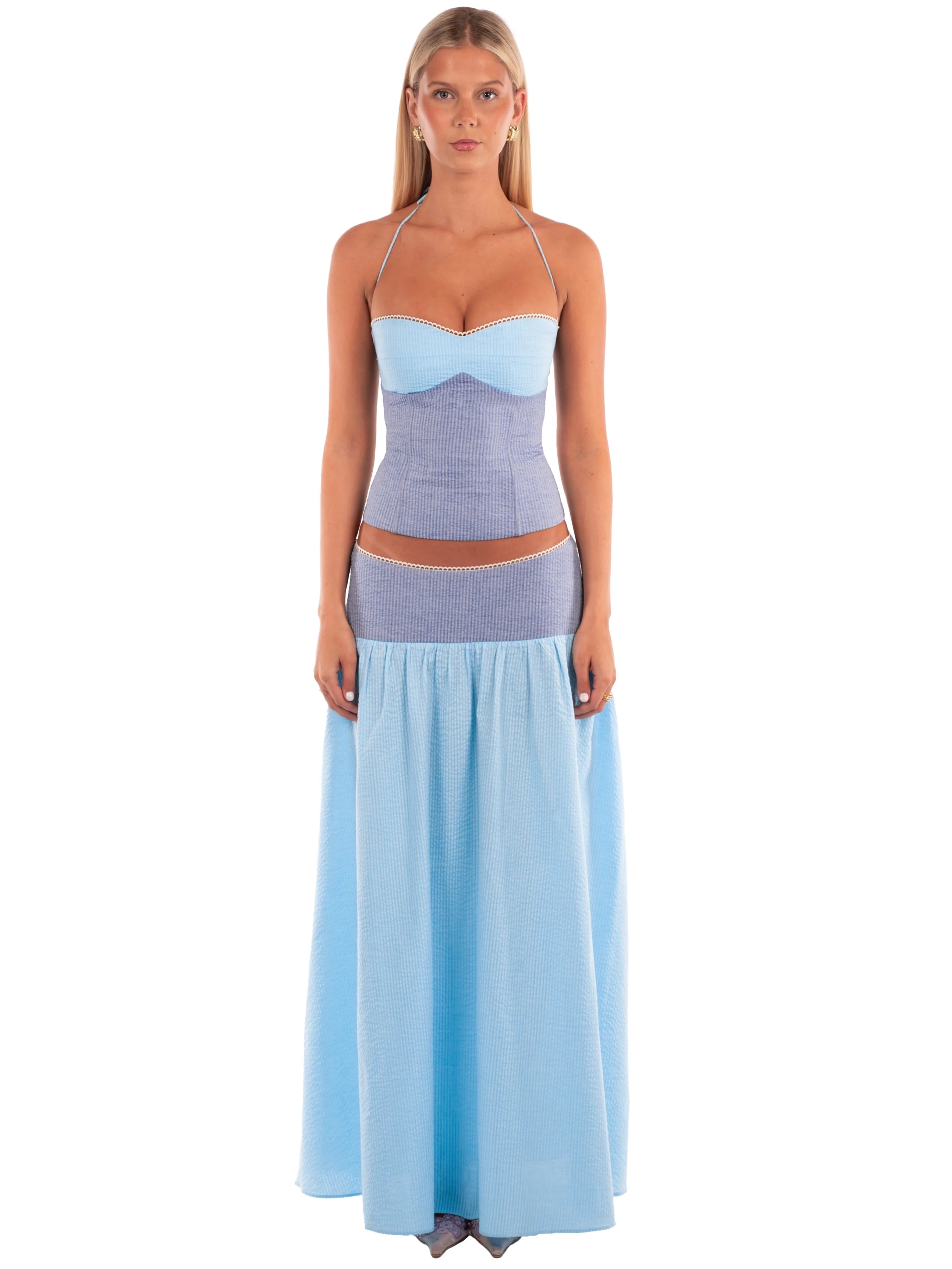Corset Set. Architectural color-blocking, and intricate textured fabric, this breezy summer ease.