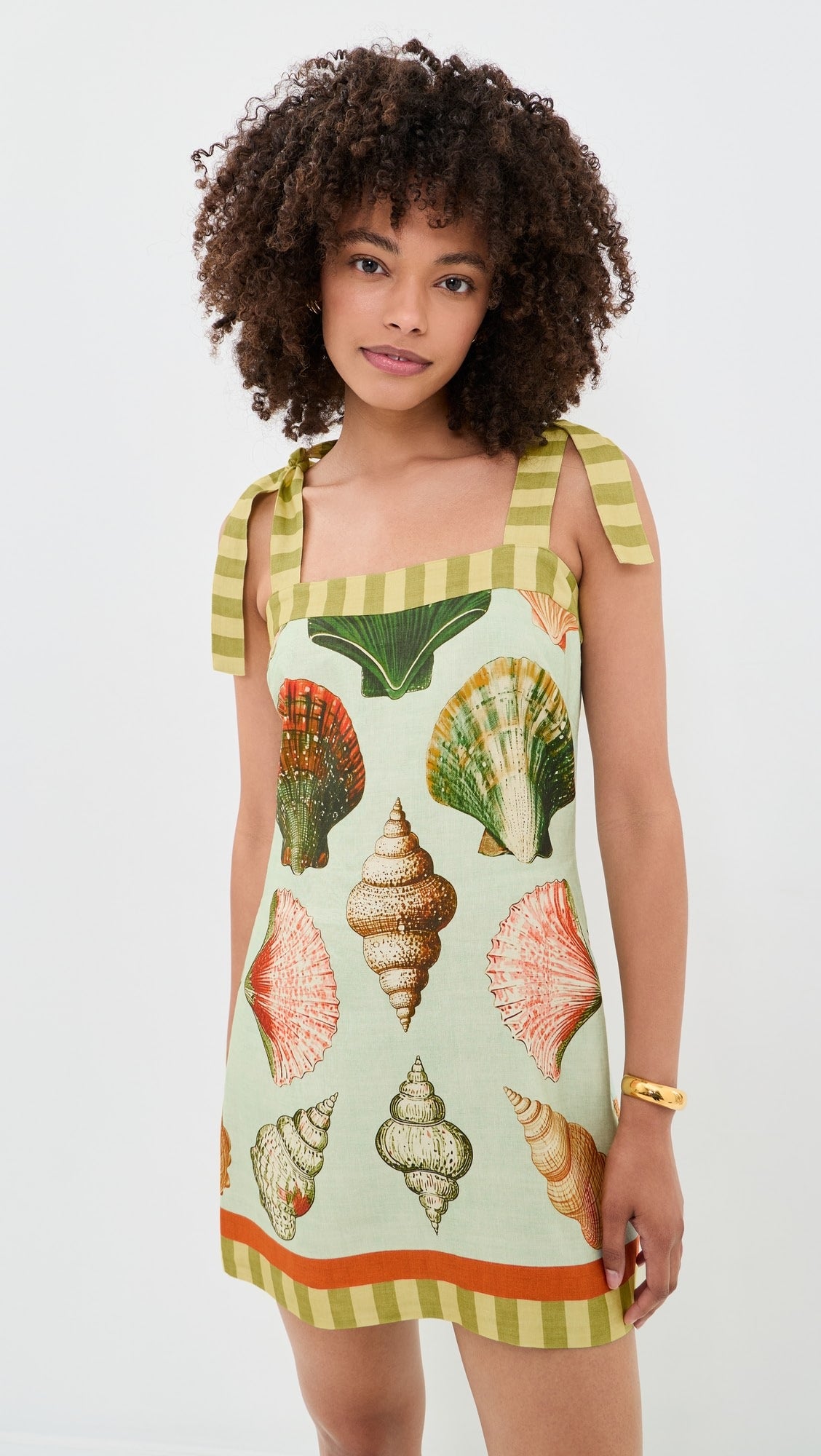 Tie-Shoulder Mini Dress.Seashell print, charming tie-straps,this mini dress is your perfect companion for seaside strolls and tropical getaways.