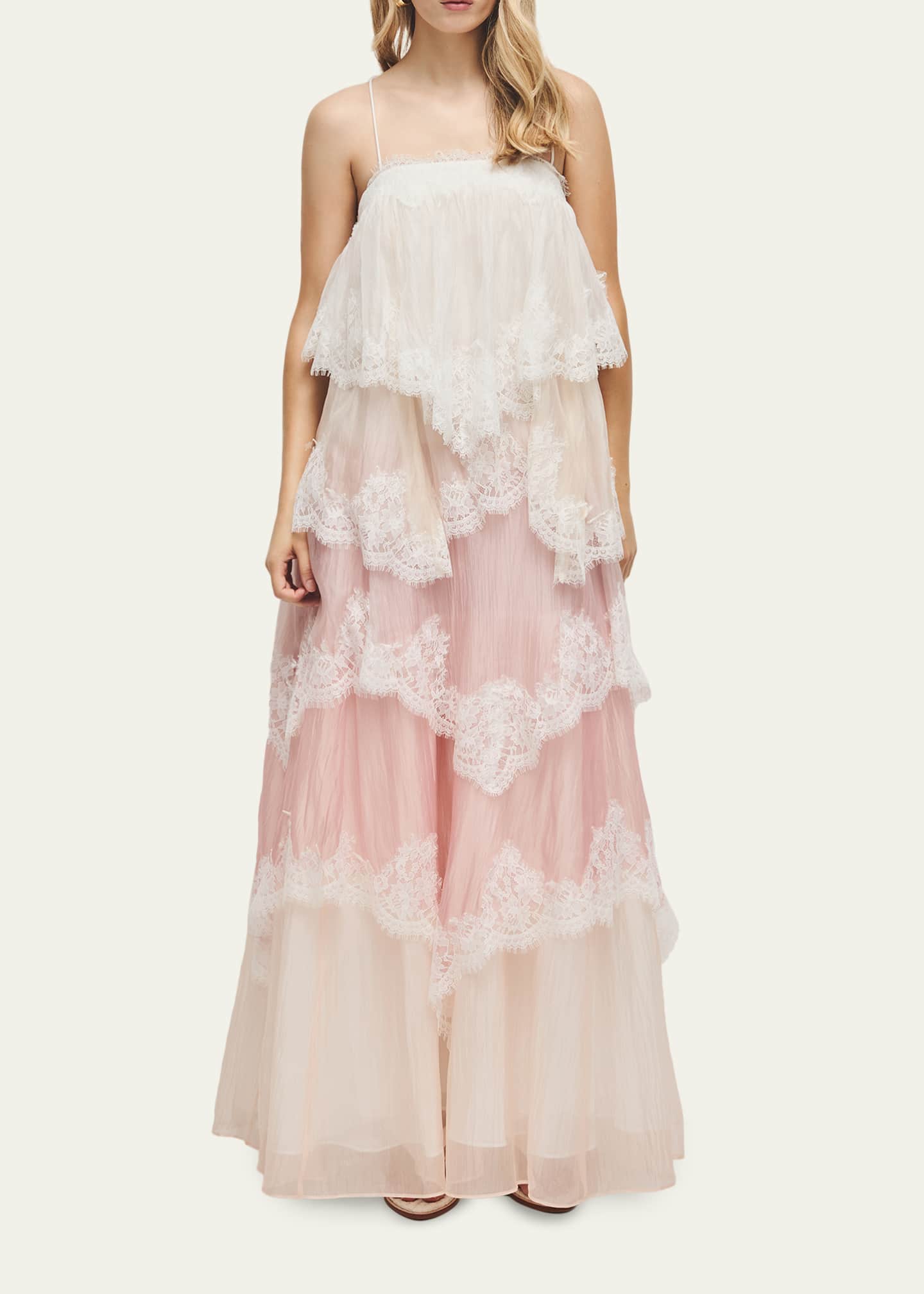 Lace Tiered Maxi Dress. Featuring cascading tiers, delicate lace trim, this gown is the ultimate choice for unforgettable sunset dinners and coastal soirées.