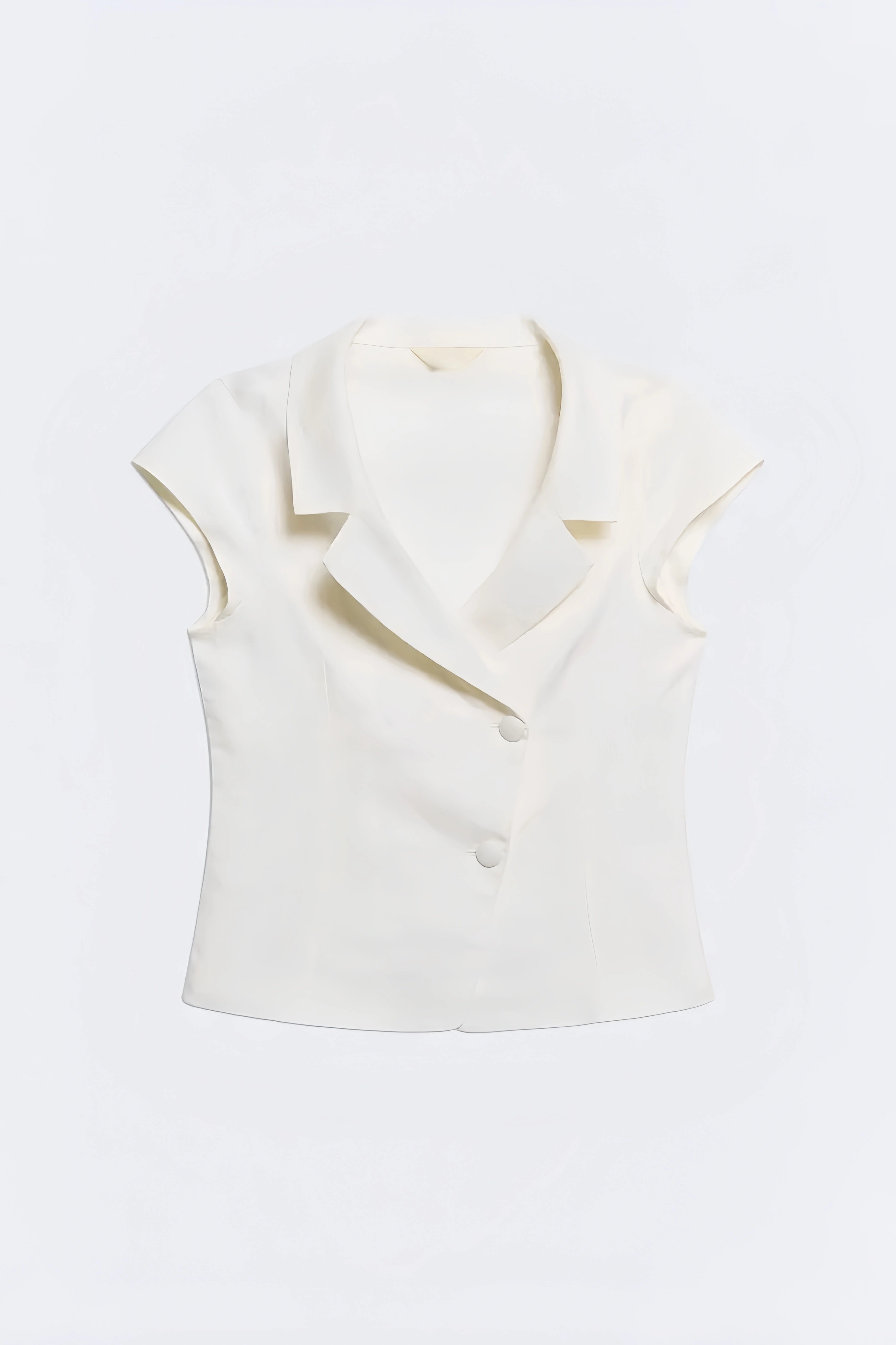 Signature Tailored Sleeveless Top. Versatile cream hue, this sleeveless waistcoat is the ultimate piece for effortless, elevated summer styling.