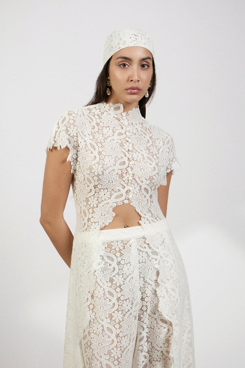 Lace Set. Intricate lace detailing, and a breezy maxi skirt, this set is the ultimate statement choice for luxury getaways and summer soirées.