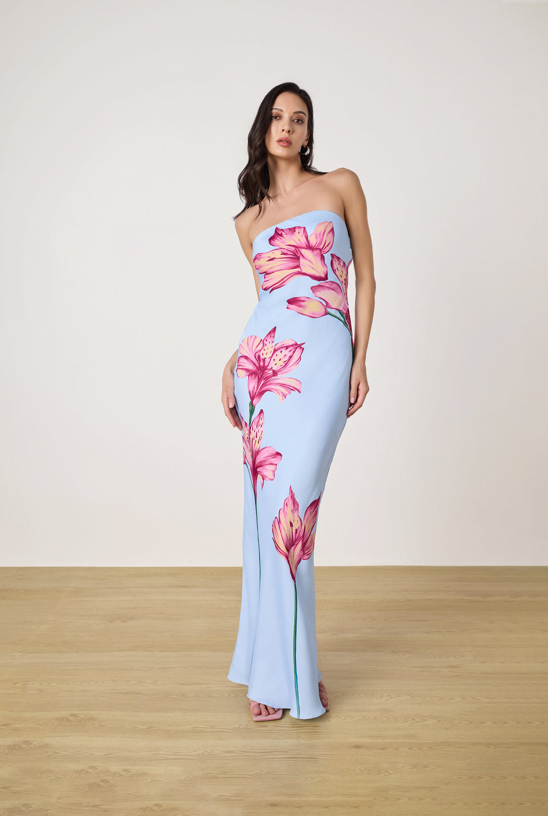 Azure Lily Strapless Maxi Dress.Hand-painted style floral print, a sleek tube-top silhouette,this gown is the ultimate statement piece for elevated summer soirées.