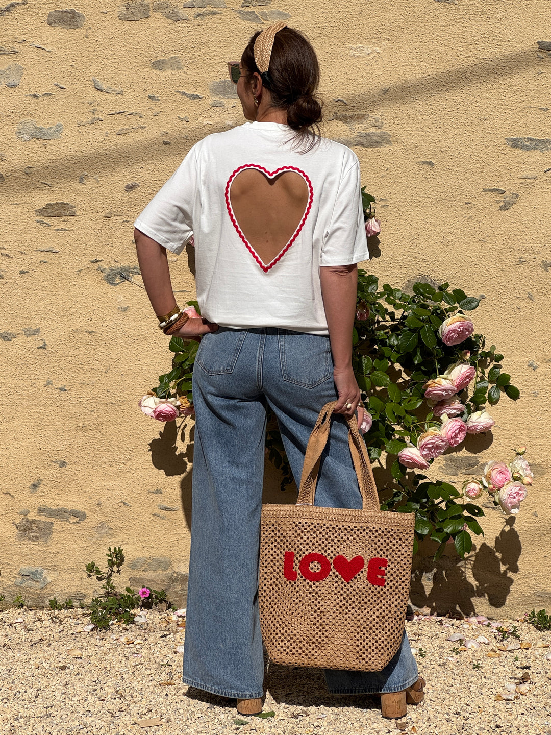 Heart Cut Out Top featuring a playful red heart detail and relaxed fit—perfect for casual days, coffee dates, travel outfits,weekend looks,and everyday styling.