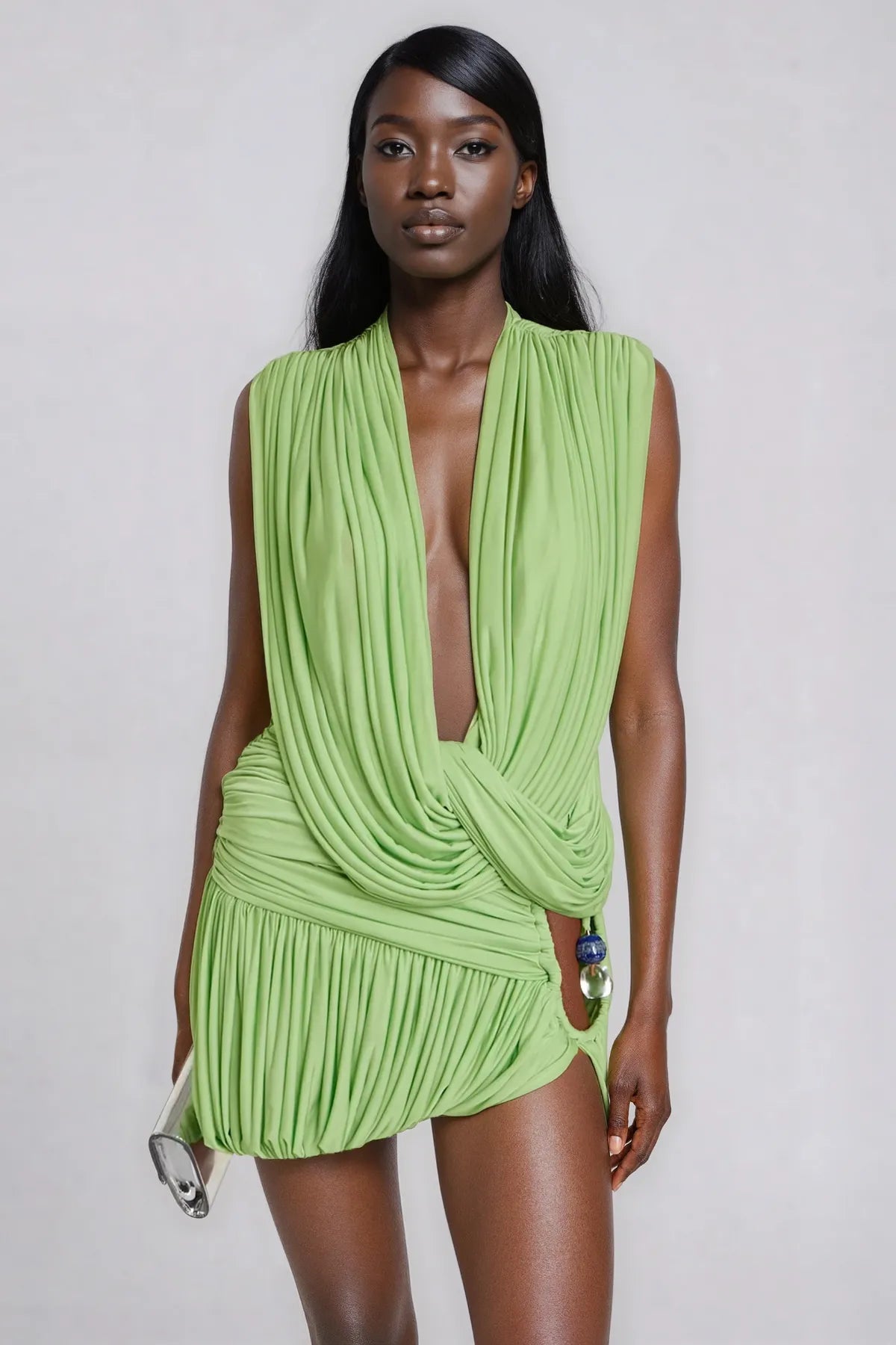 Featuring a dramatic plunging neckline, exquisite ruching,this two-piece ensemble is the ultimate choice for high-impact summer evenings and coastal galas.