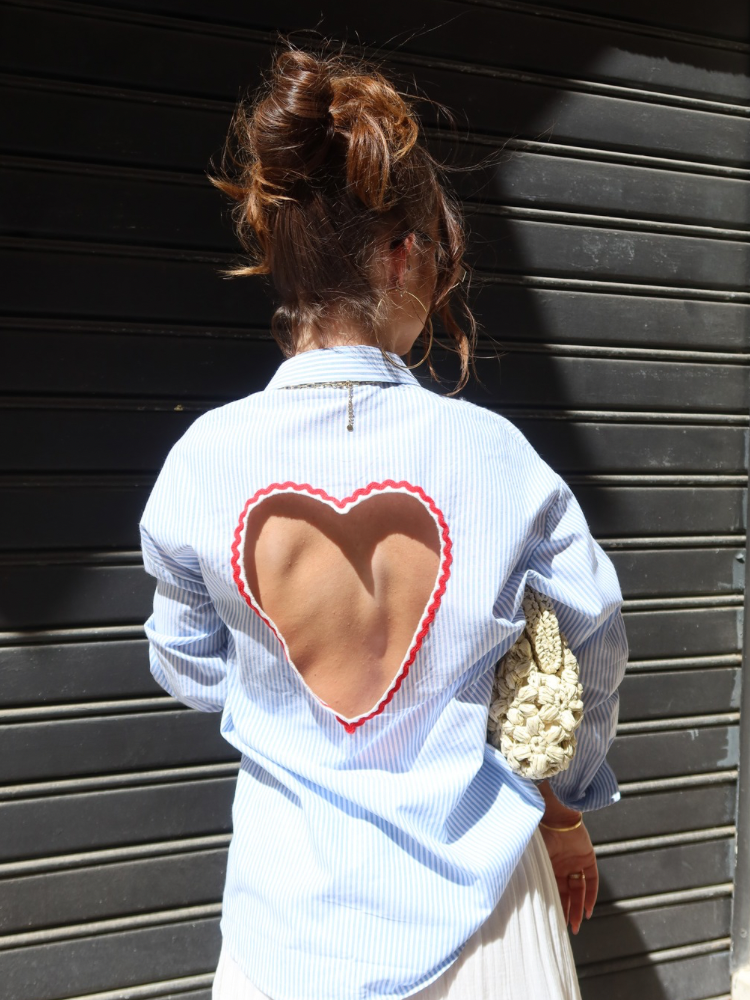 Dramatic open heart-shaped back with romantic red scalloped embroidery, this piece is the ultimate statement choice for effortless summer charm.