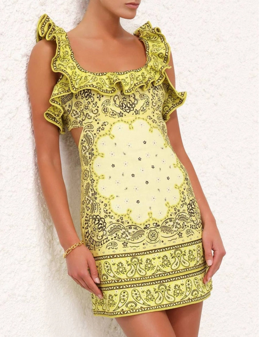 Featuring vibrant paisley prints, dramatic ruffled shoulders, and a chic side cut-out, this dress is the ultimate choice for elevated summer garden parties.