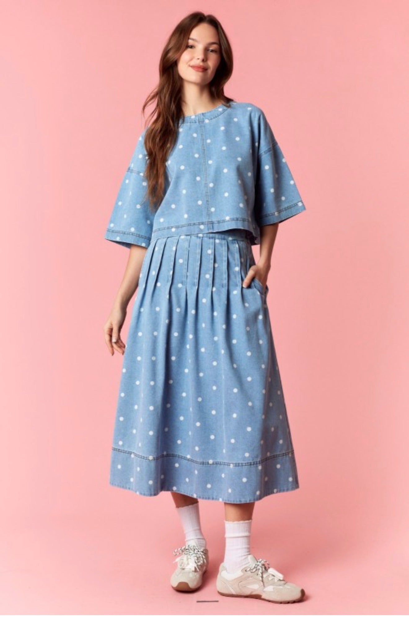 Featuring a classic light blue denim base with crisp white polka dots,  this matching set is the ultimate statement piece for casual urban getaways.