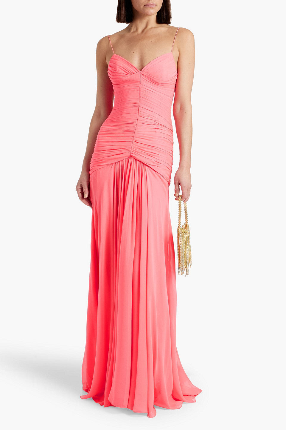 Featuring delicate spaghetti straps, intricate body-contouring ruching,this gown is the ultimate choice for luxury resort getaways.