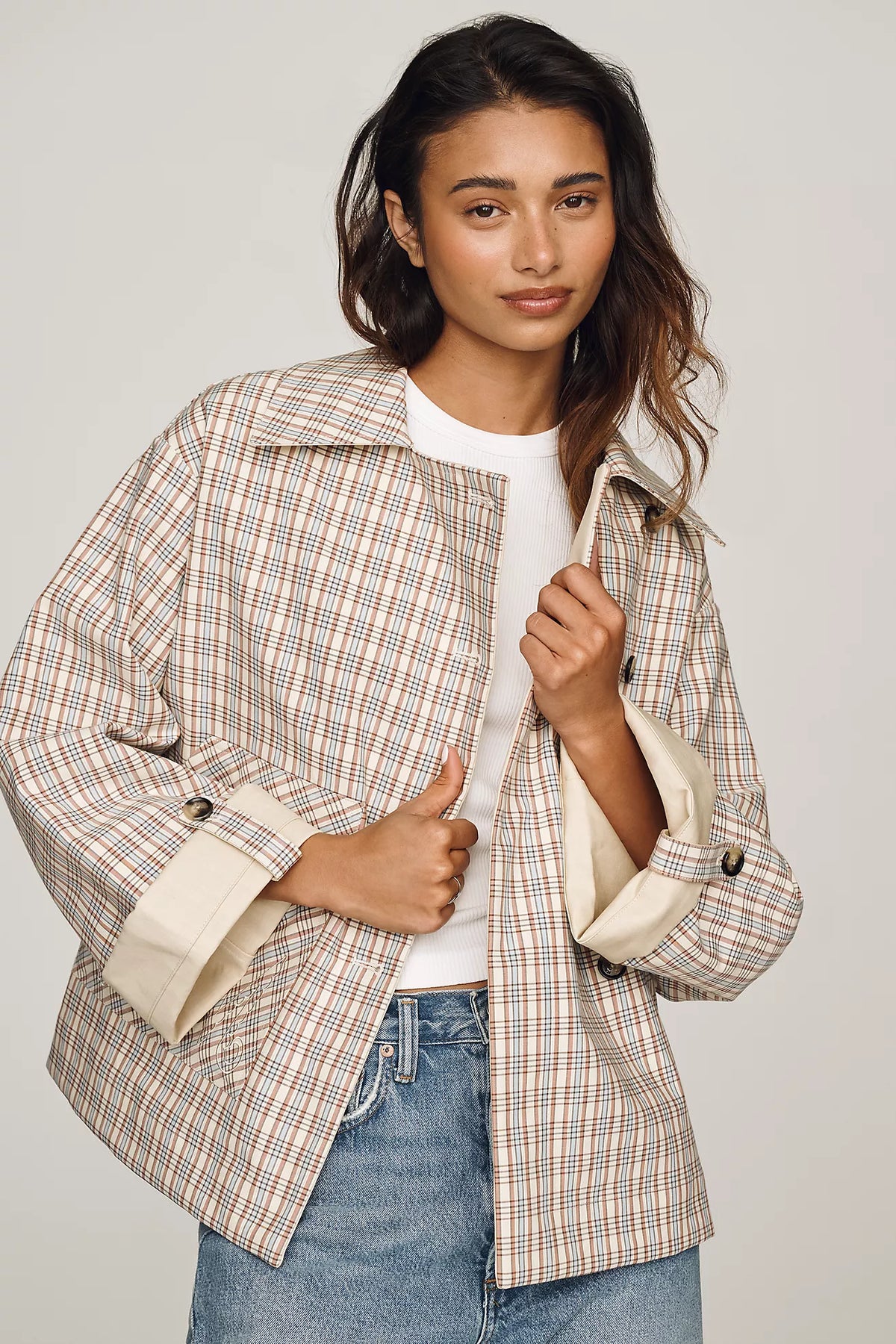Featuring with classic neutral plaid check on one side and a clean solid cream tone,this jacket is the ultimate statement piece for chic urban getaways.