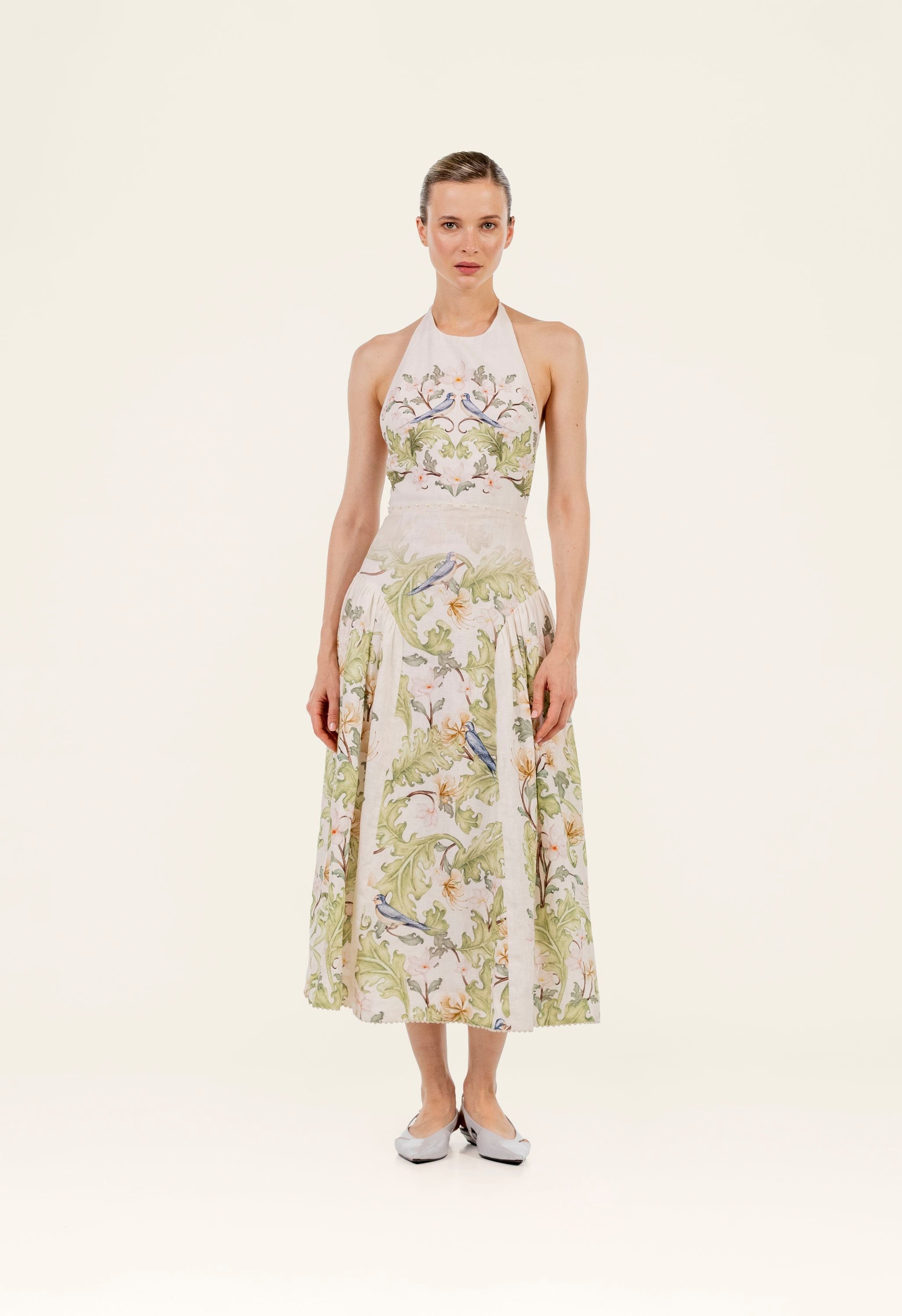 Botanical Halter Maxi Dress. Artistic piece with unique nature-inspired prints. Perfect for elegant summer occasions. 