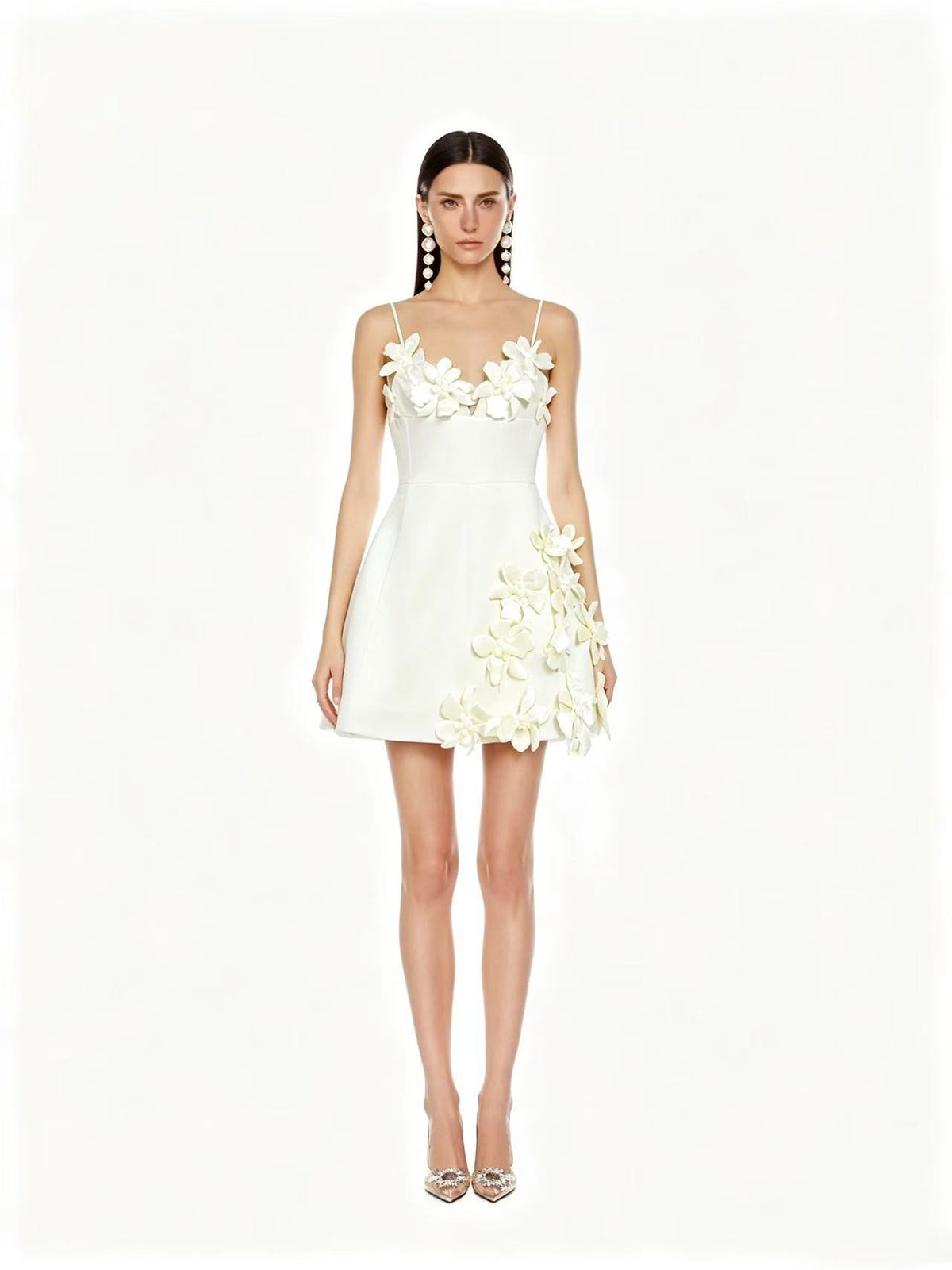 Featuring a intricate 3D floral blooming along the sweetheart neckline and side skirt,this dress is the ultimate statement piece for luxury resort getaways.