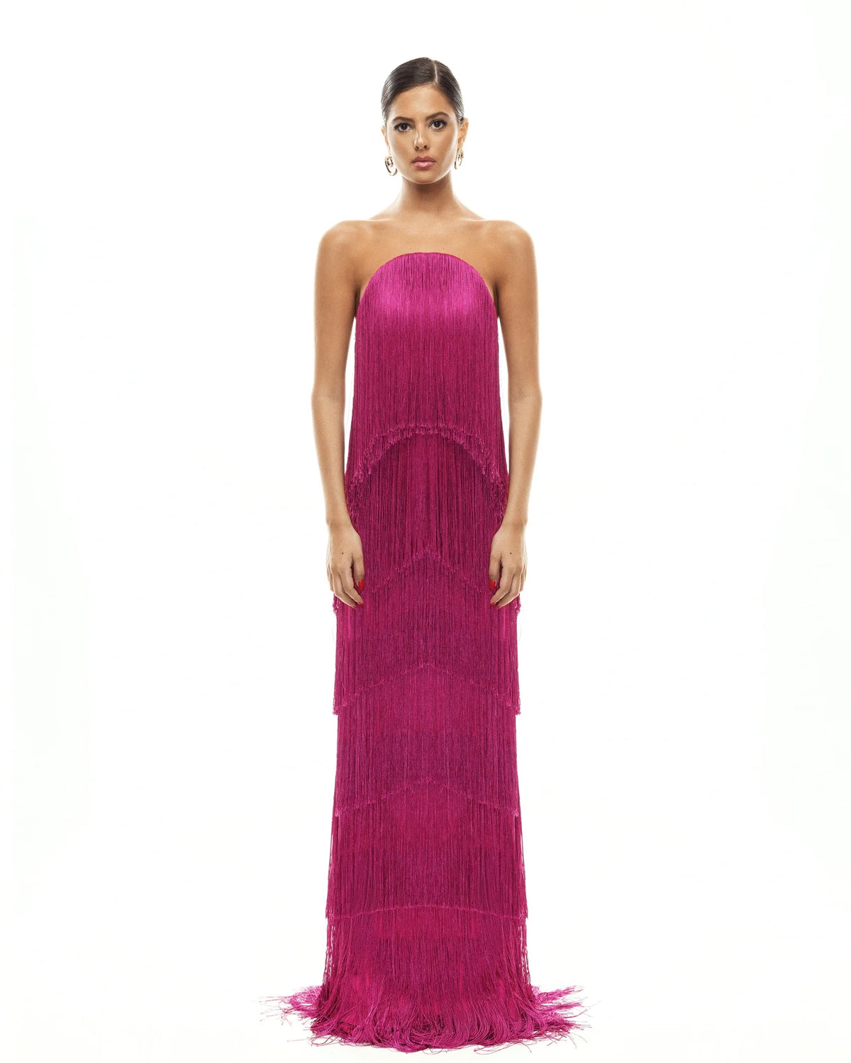 Featuring a multi-tiered fringe layers that create incredible movement, this dress is the ultimate statement piece for luxury resort getaways.