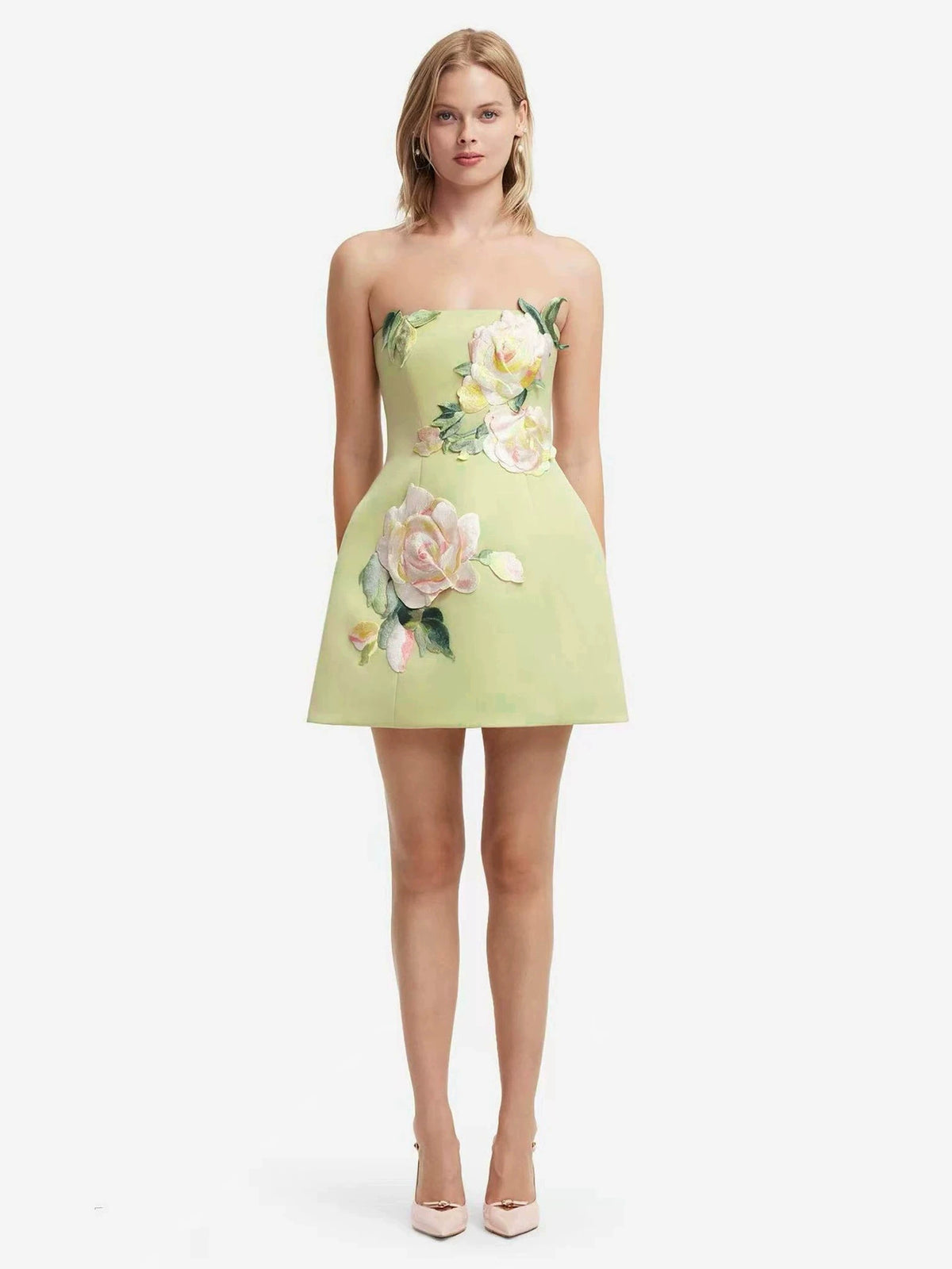 Featuring a s stunning 3D embroidered pink rose appliqués and a chic strapless A-line silhouette, this dress is the ultimate statement piece for resort getaways.