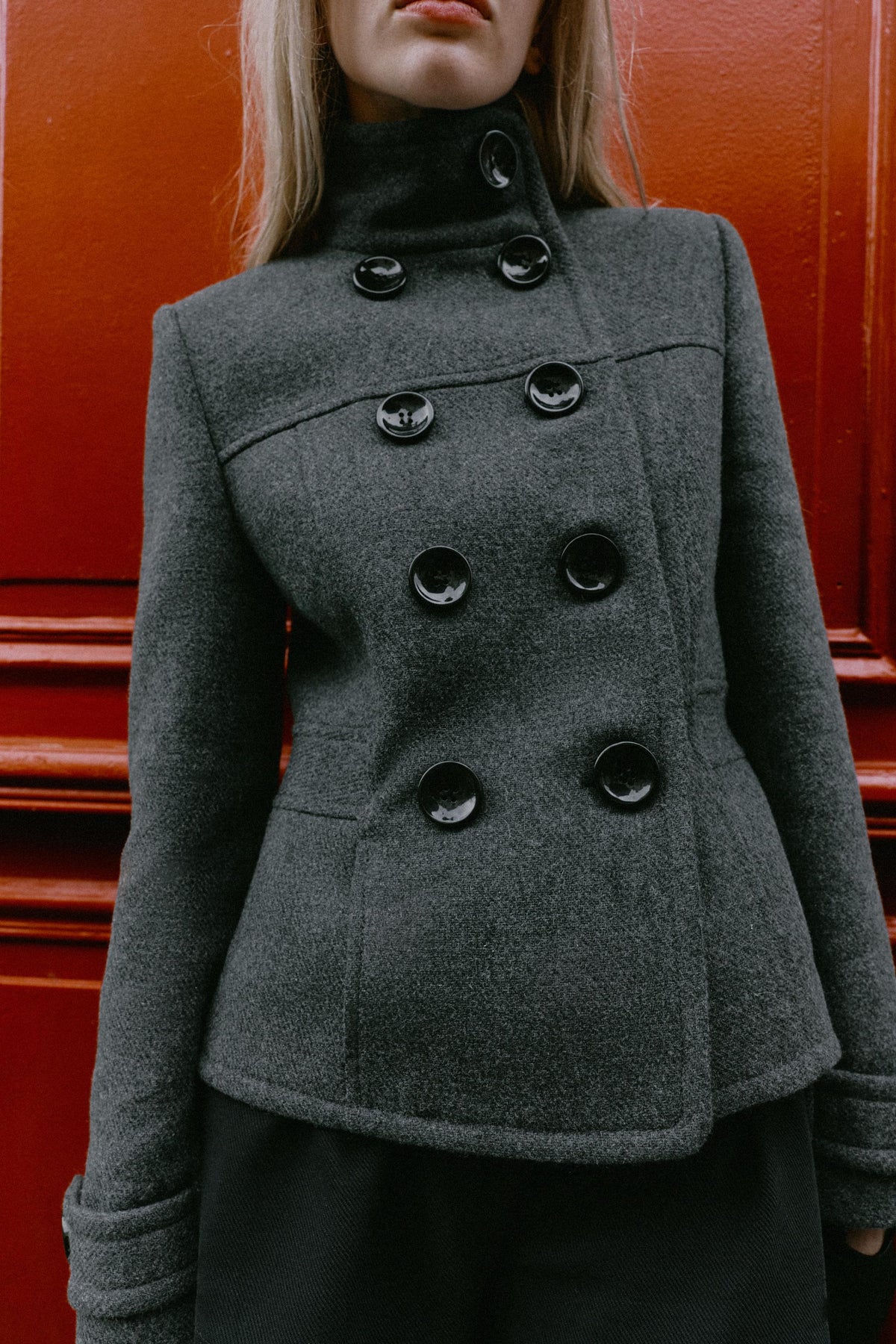 Elevate your wardrobe with the Seashellly Double-Breasted High-Neck Jacket. Features rich dark button details, a funnel collar, and tailored seams.