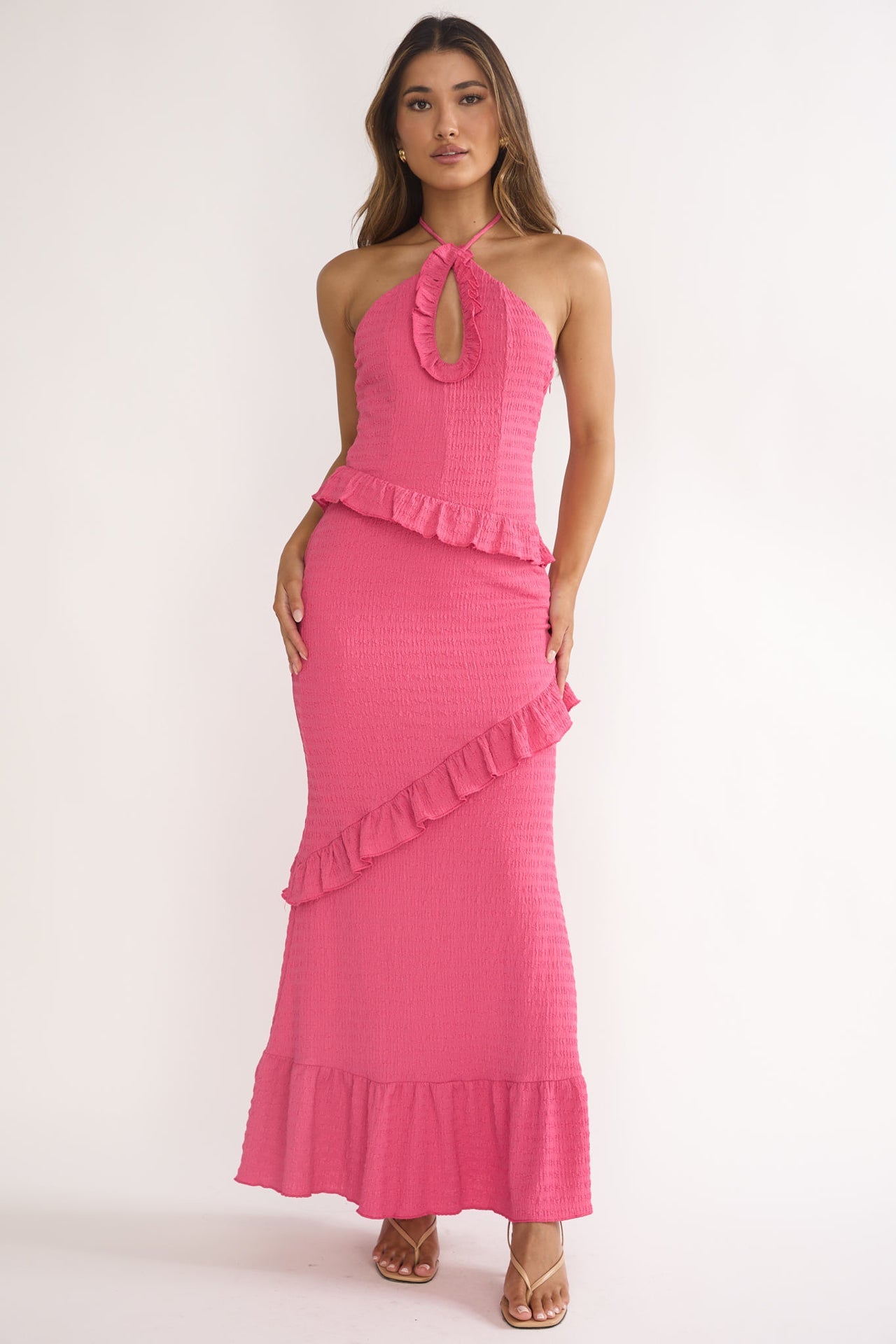Textured Halter Maxi Dress. Featuring a sophisticated keyhole halter neckline,this vibrant piece is the ultimate choice for elevated vacation style.